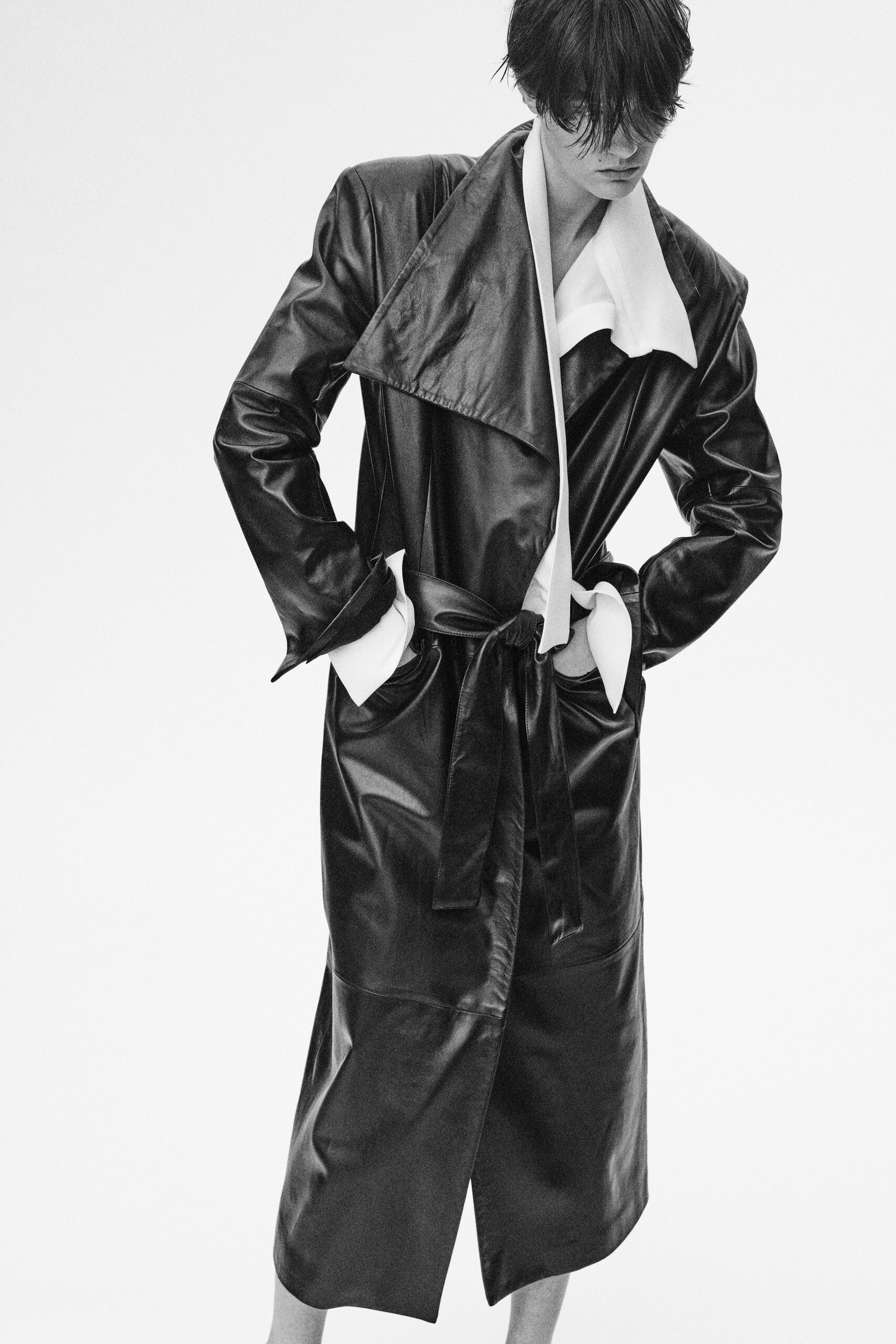 black leather long-sleeve collared fitted belted midi coat