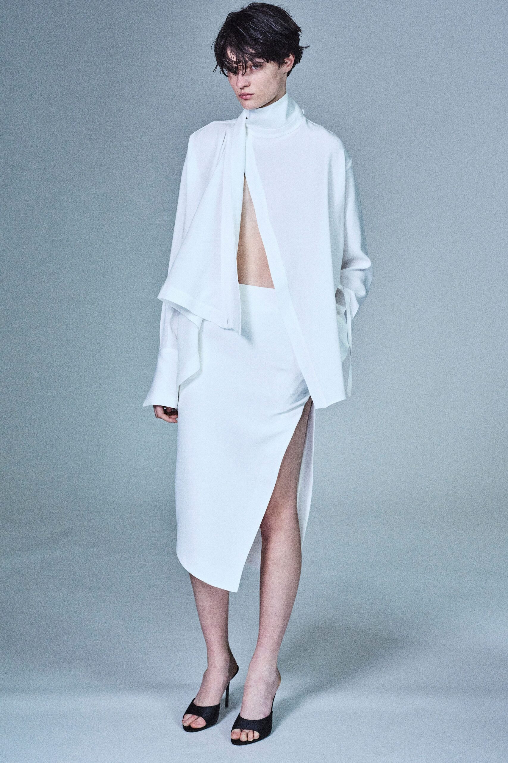 white relaxed top and fitted skirt