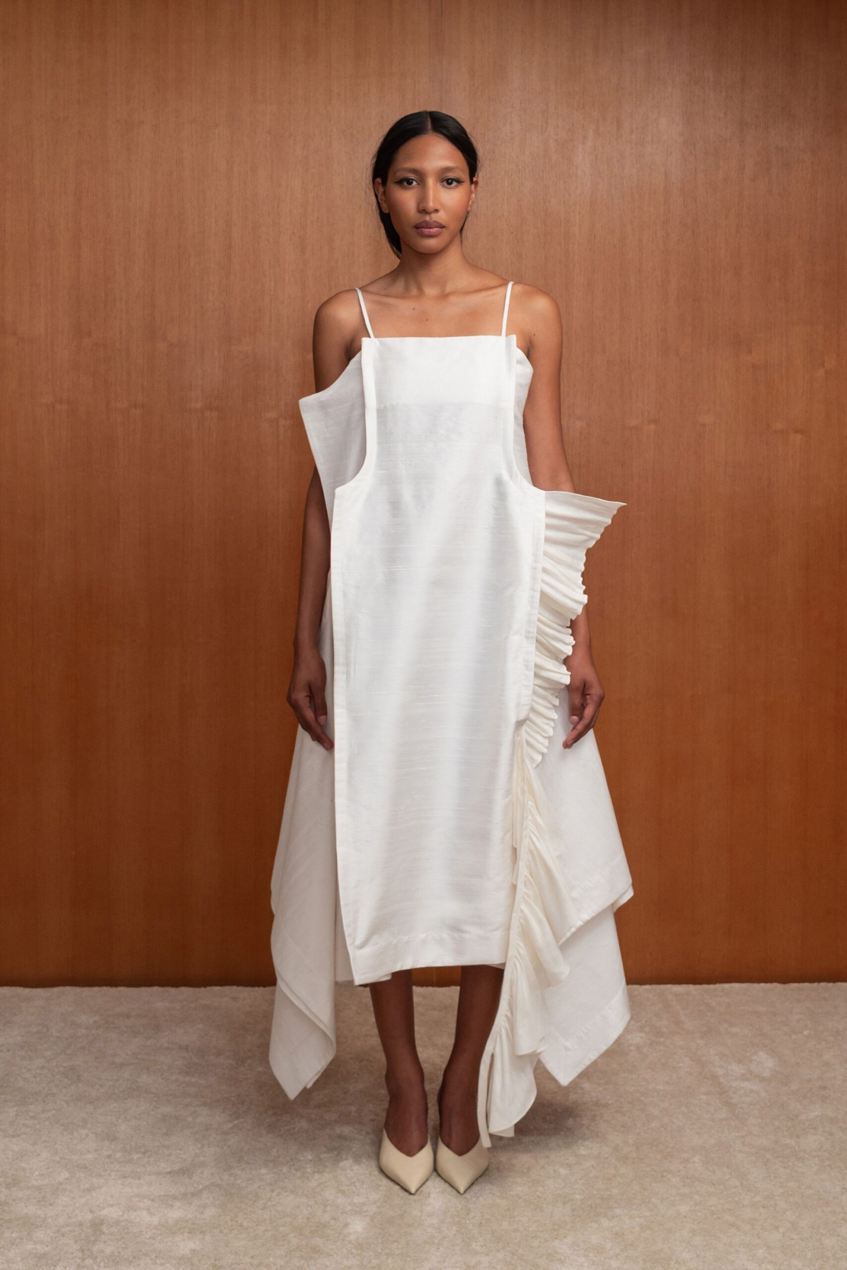 white silk sleeveless fitted pleated draped midi dress