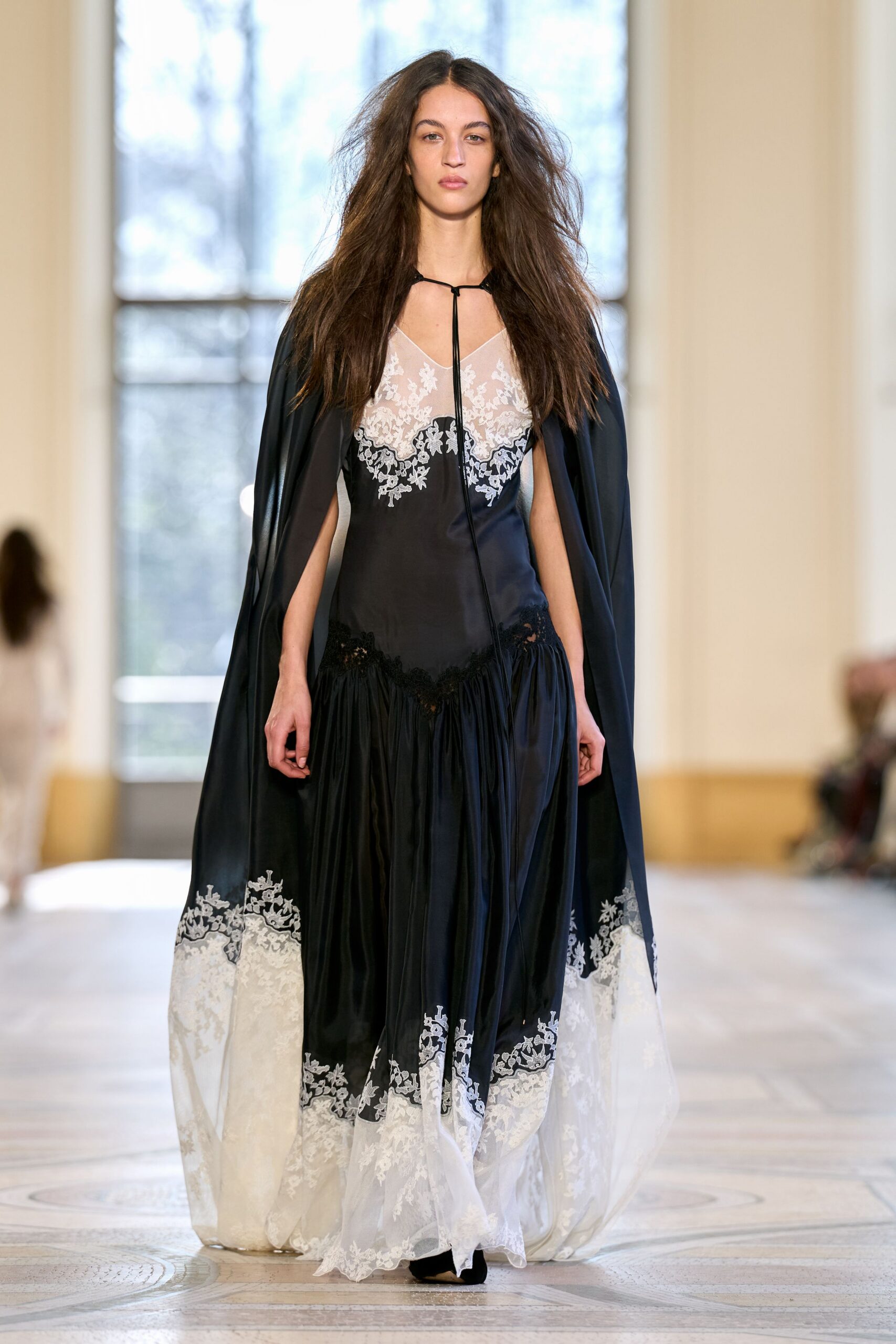 black silk sleeveless v-neck fitted layered embroidered gown