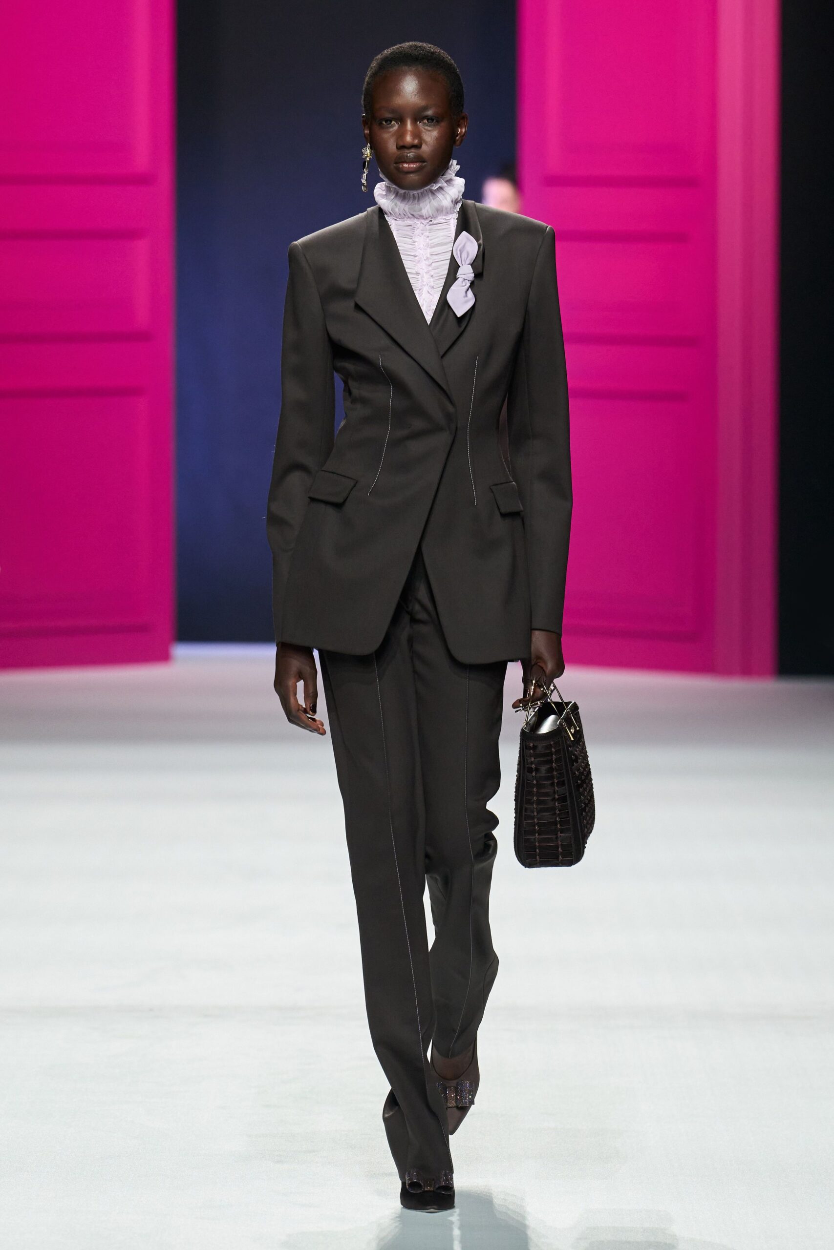 gray tailored suit with white top