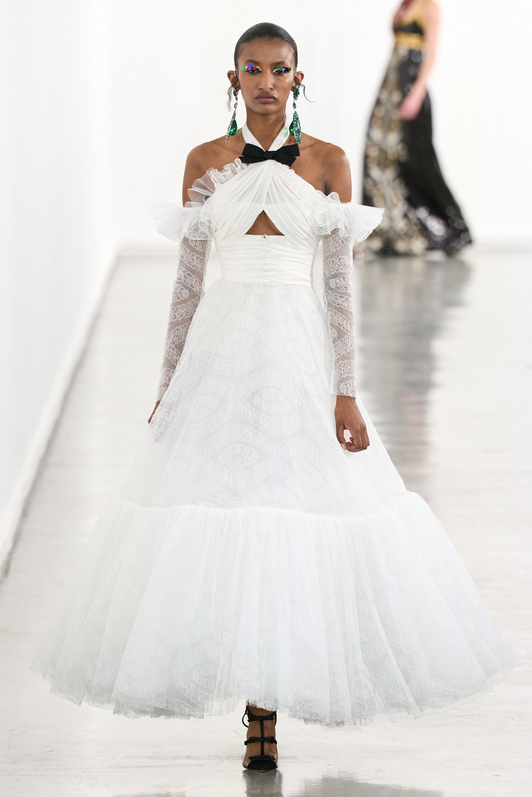 white lace sleeveless off-shoulder fitted ruffled tiered gown