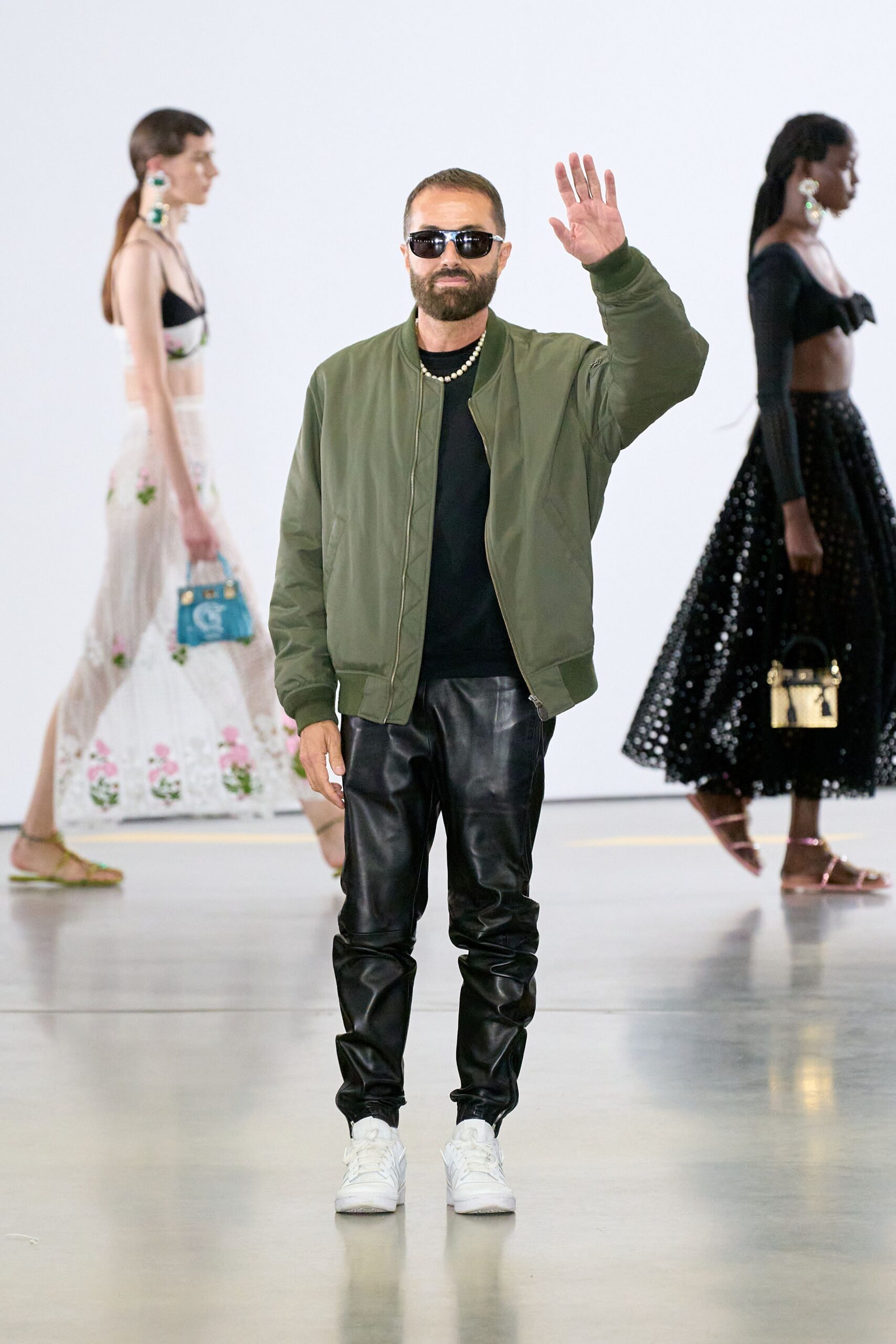green relaxed jacket black leather pants