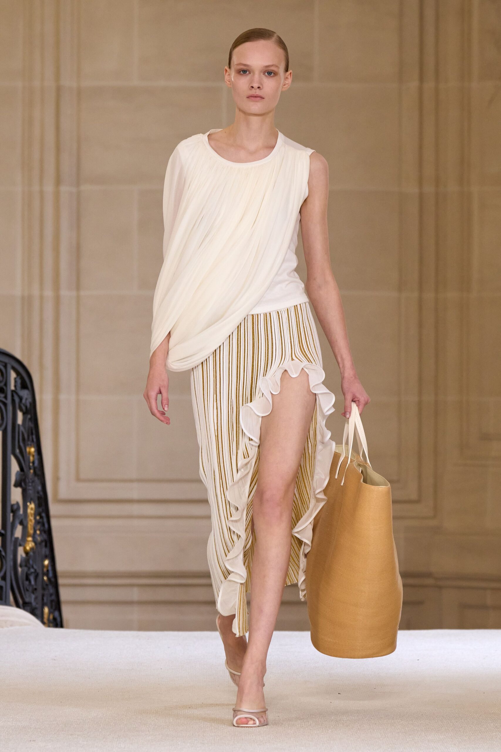 white silk top and ruffled skirt