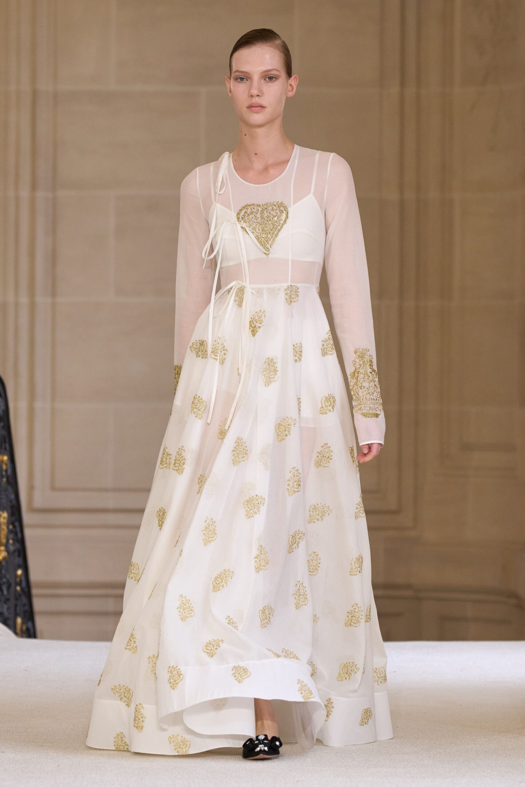 white silk embroidered gown
