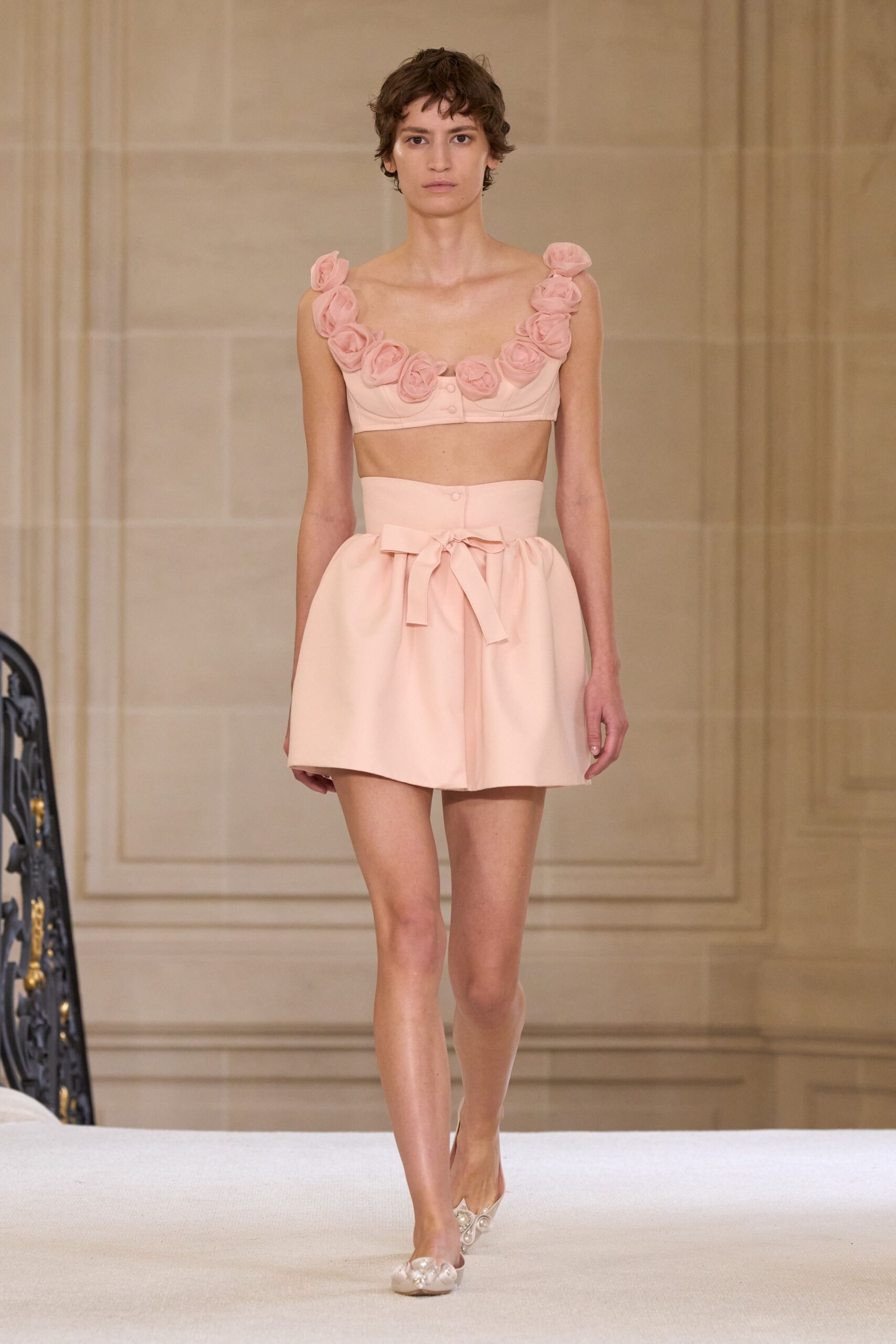 pink ruffled top and skirt