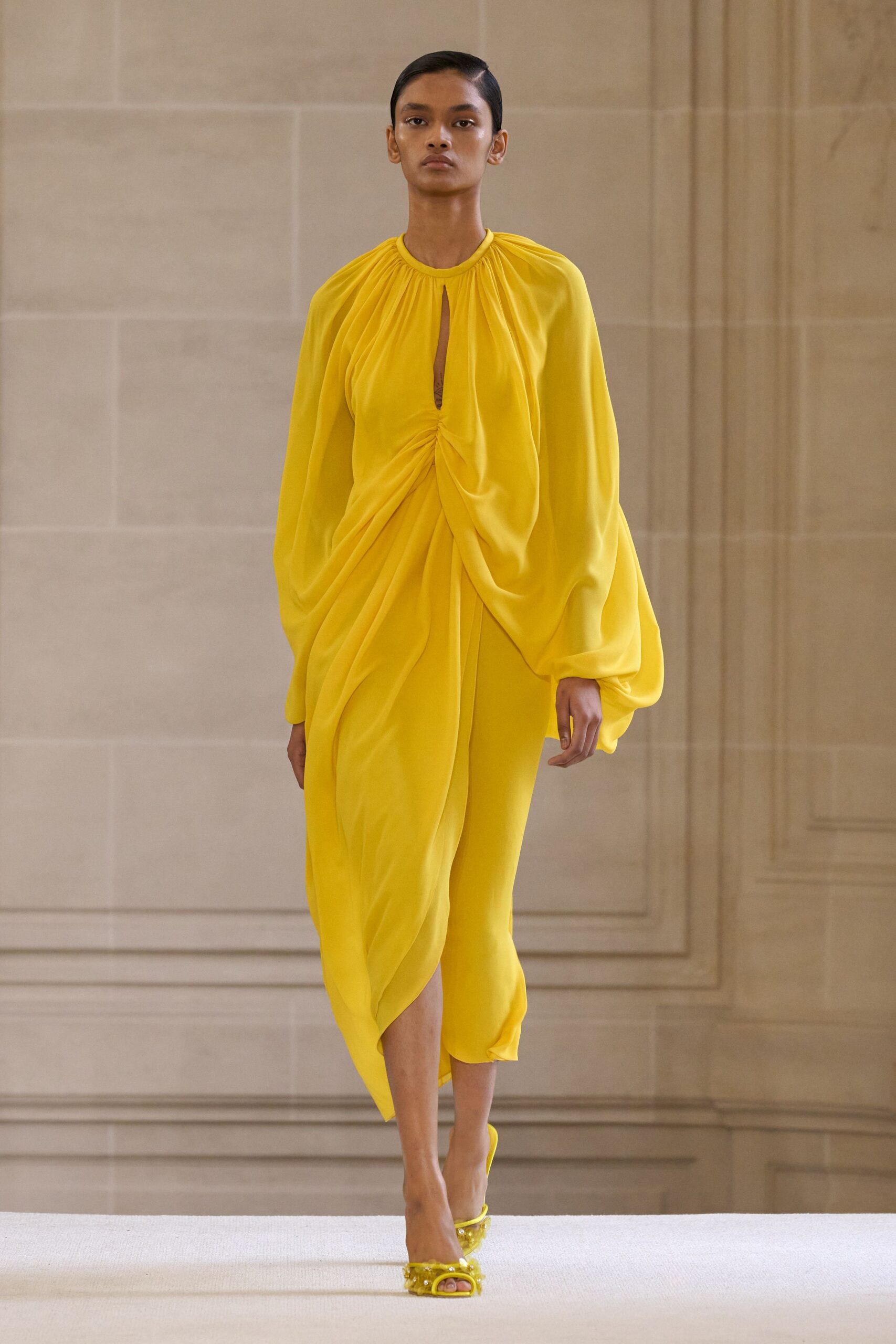 yellow chiffon midi dress with embellished shoes