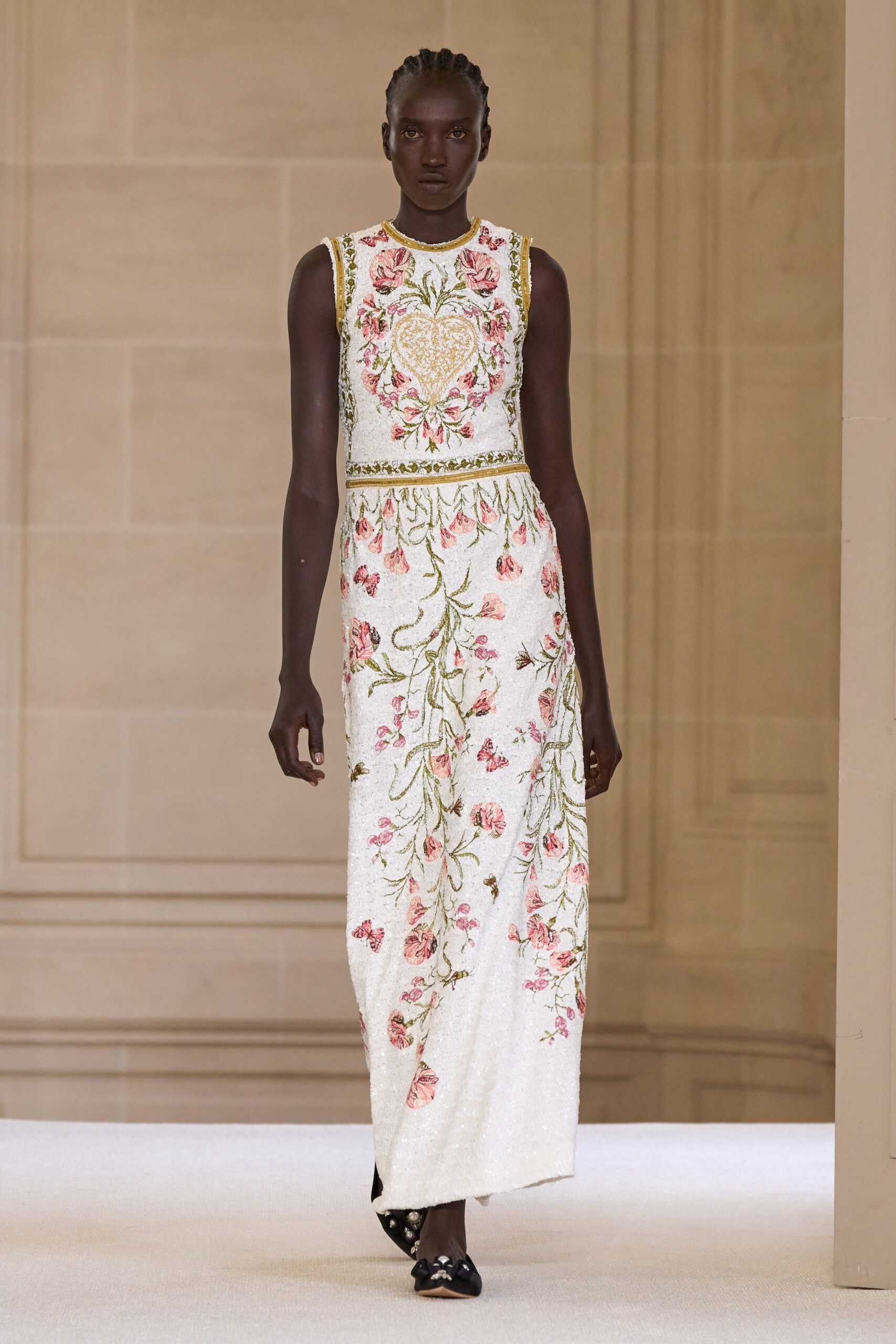 white embroidered maxi gown with black shoes