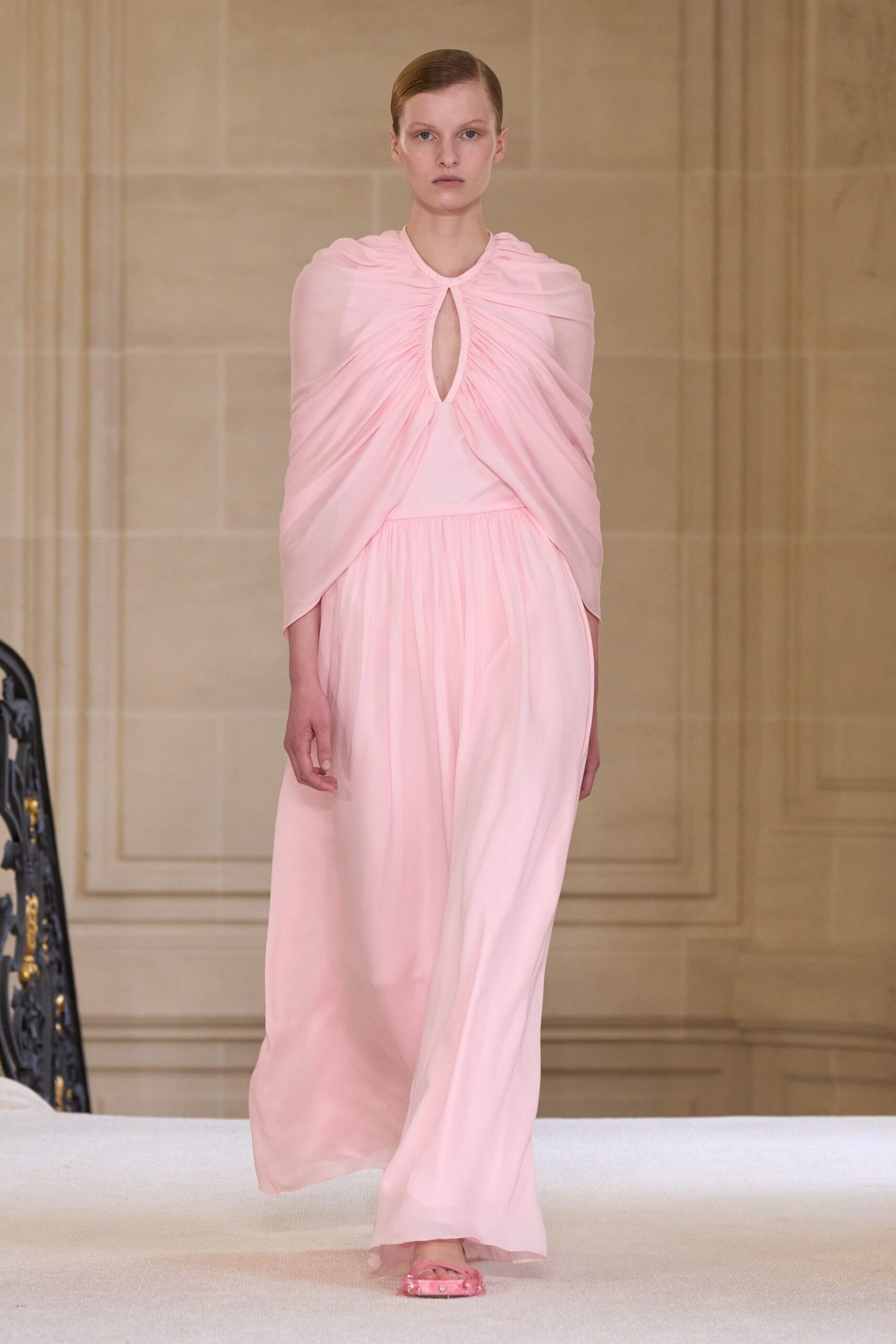 pink silk draped gown with embellished shoes