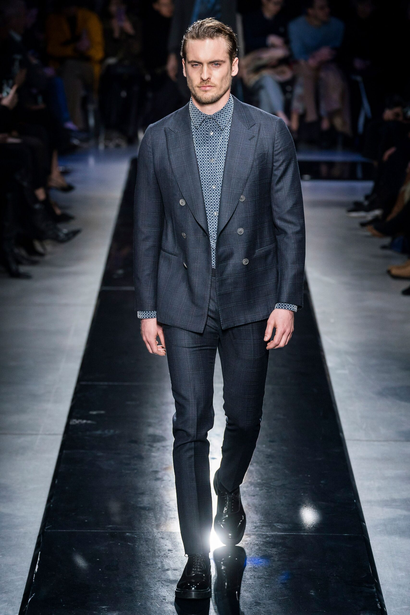 gray tailored suit with blue shirt