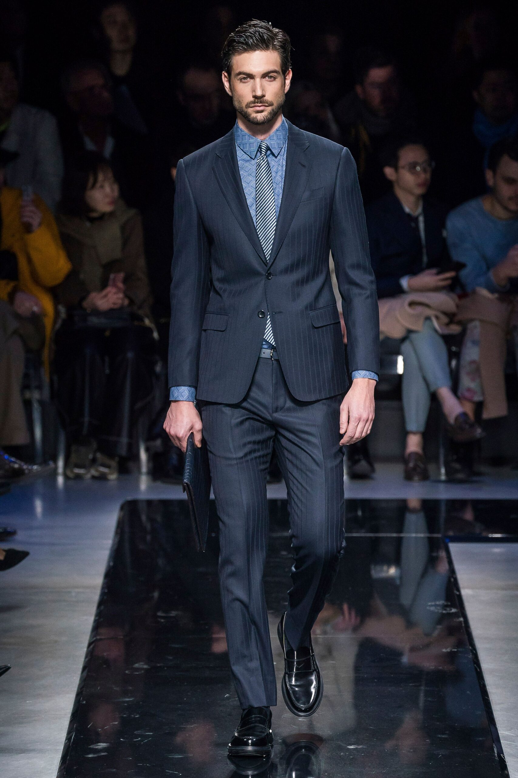 navy tailored suit with blue shirt