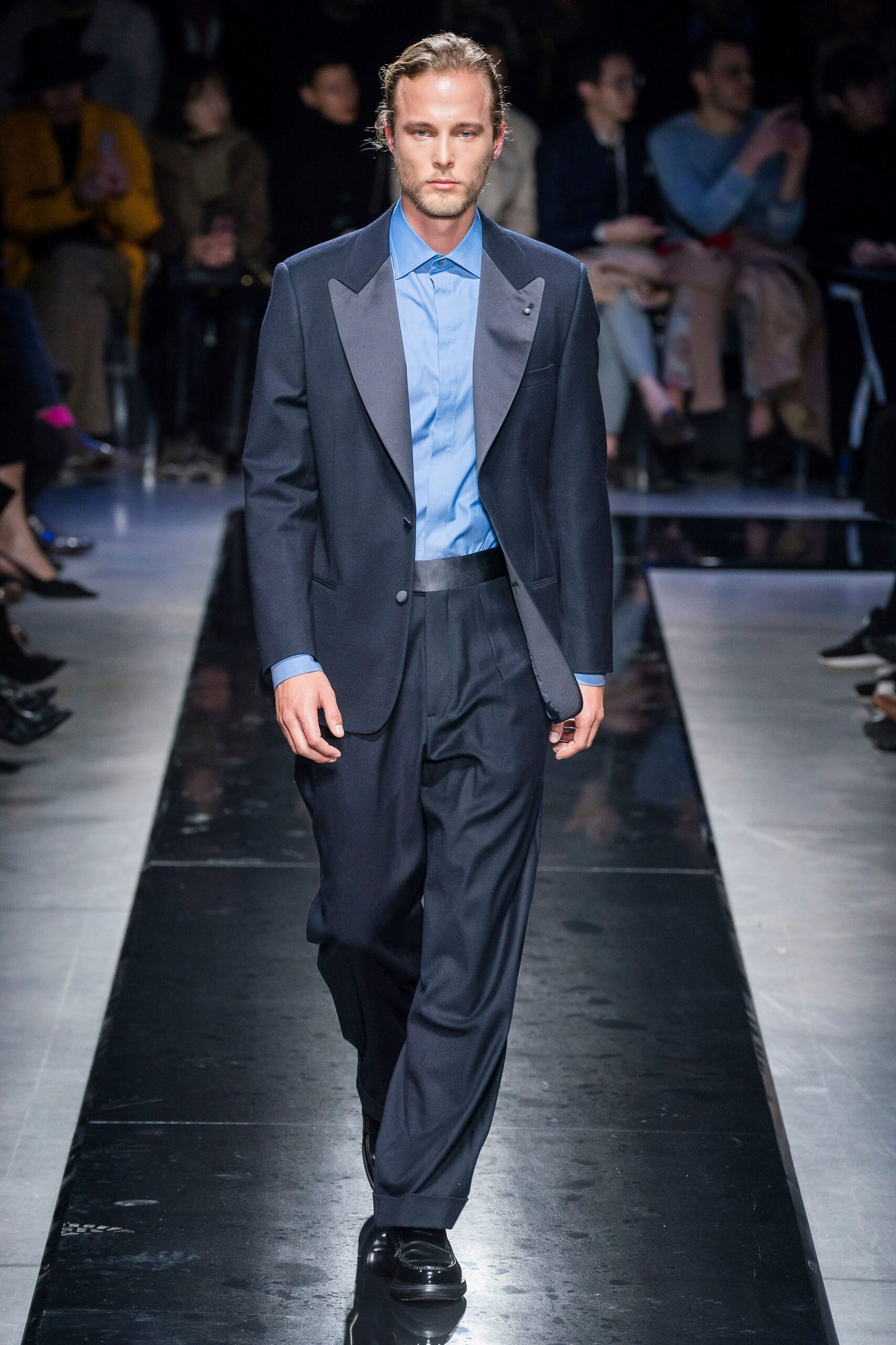 navy tailored suit with light blue shirt