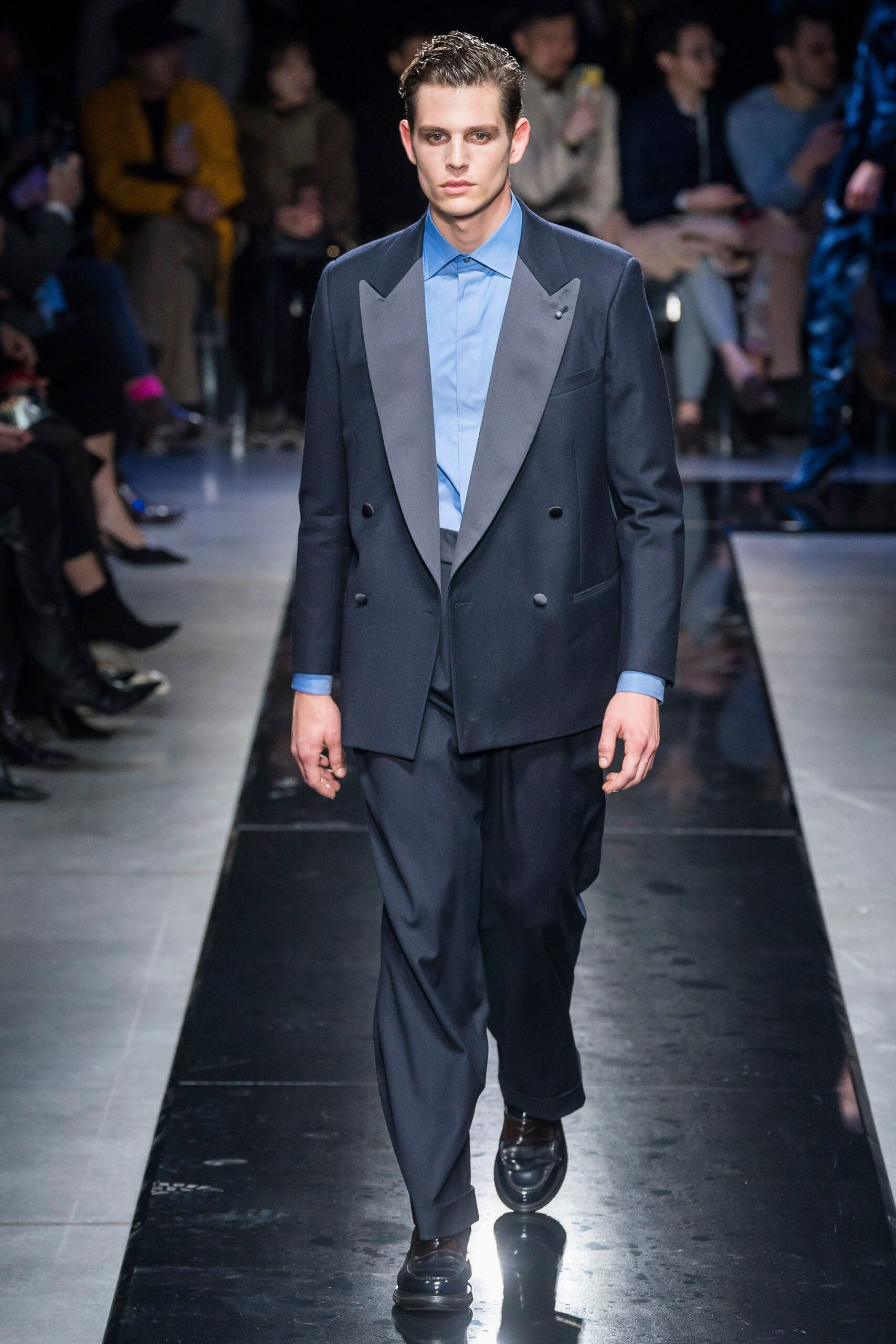 black tailored suit with blue shirt