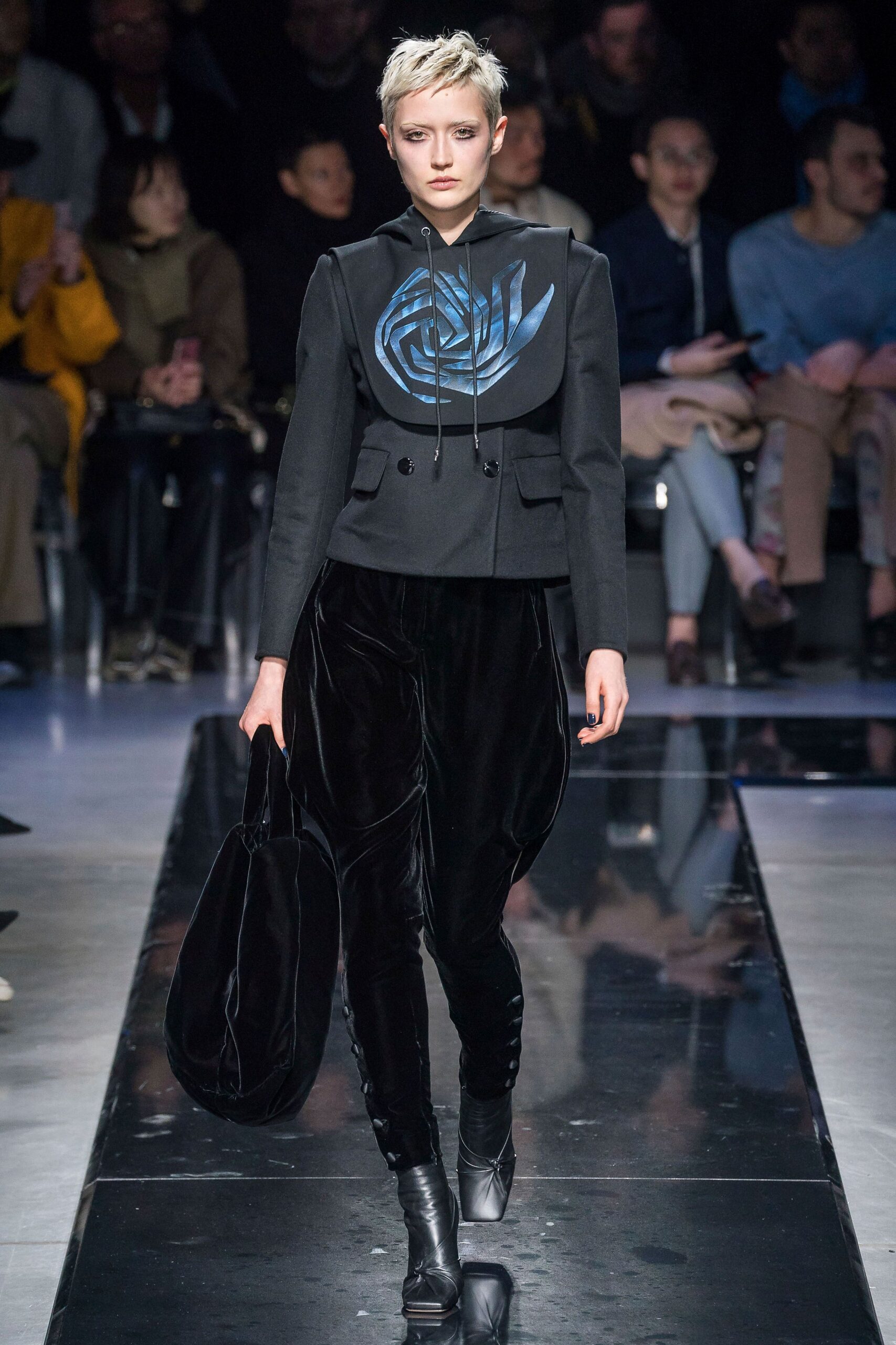 black fitted jacket and velvet pants