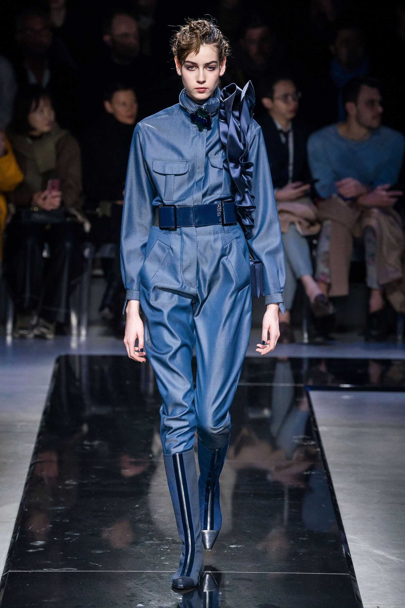 blue fitted jumpsuit with boots