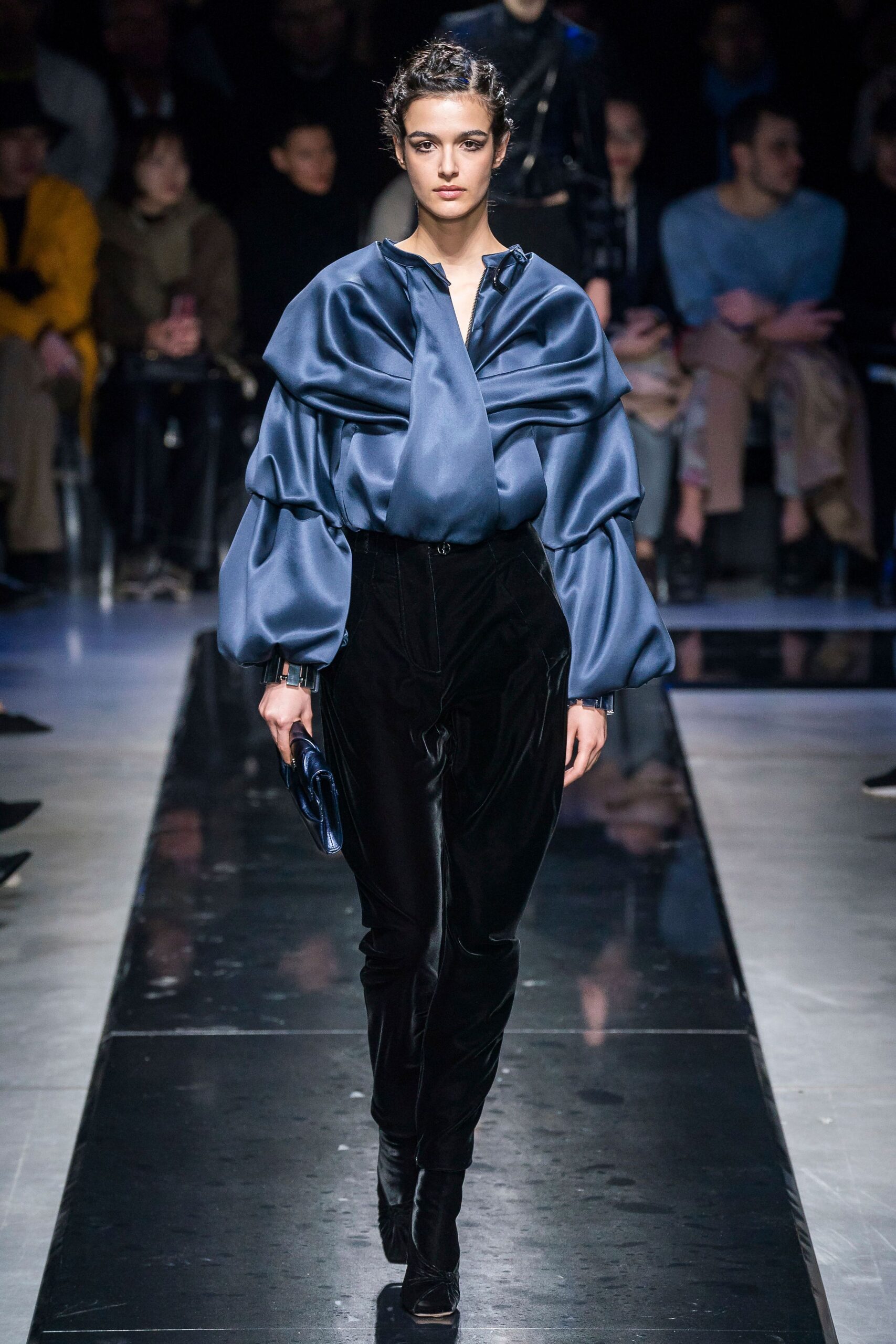 blue silk top with black pants