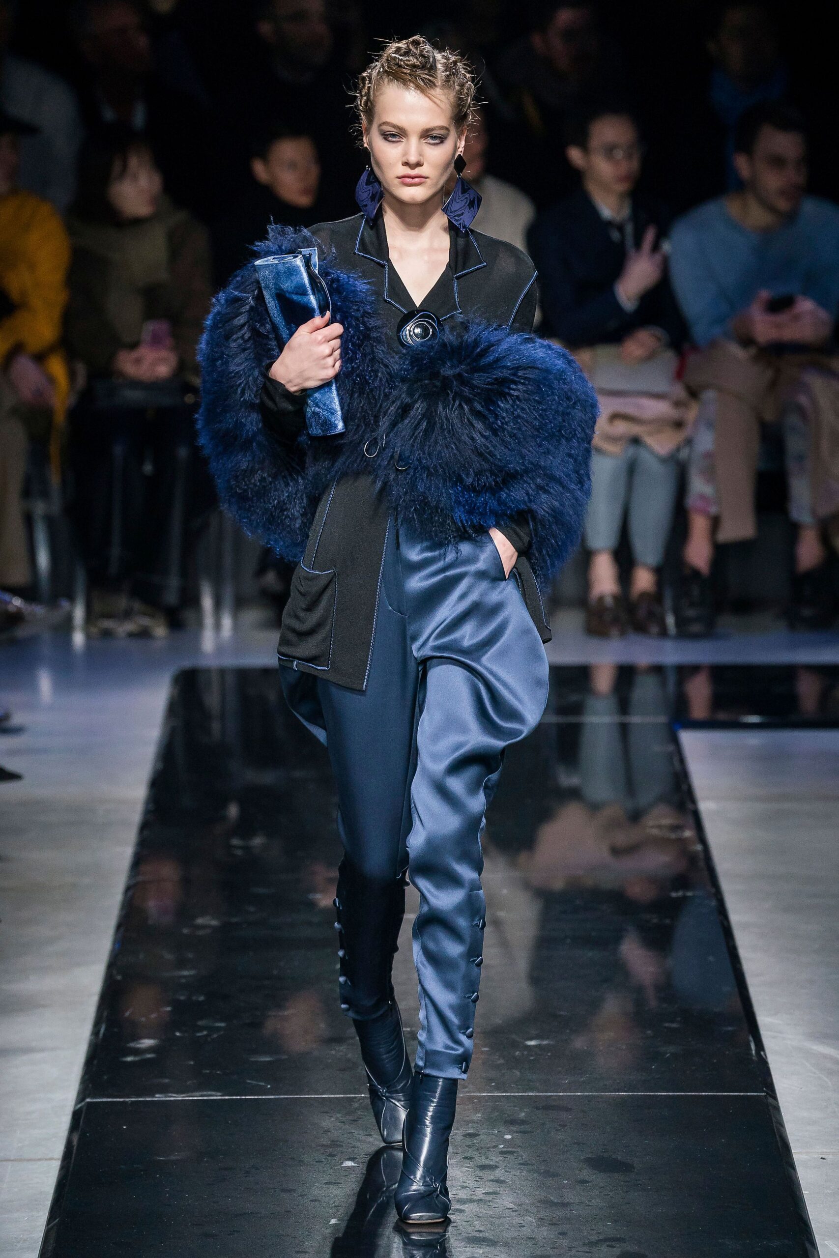 black wool coat with blue pants
