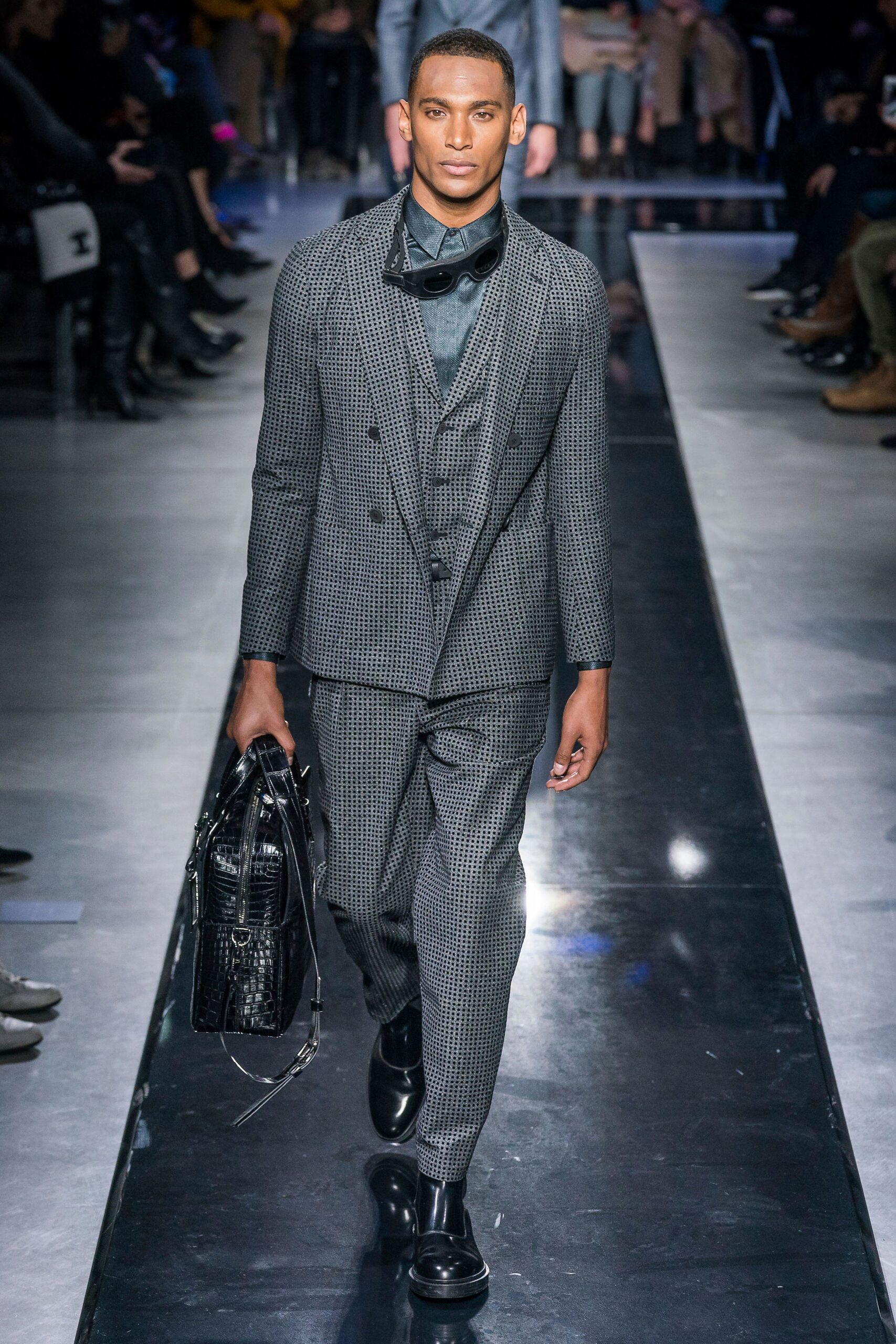gray tailored suit with blue shirt
