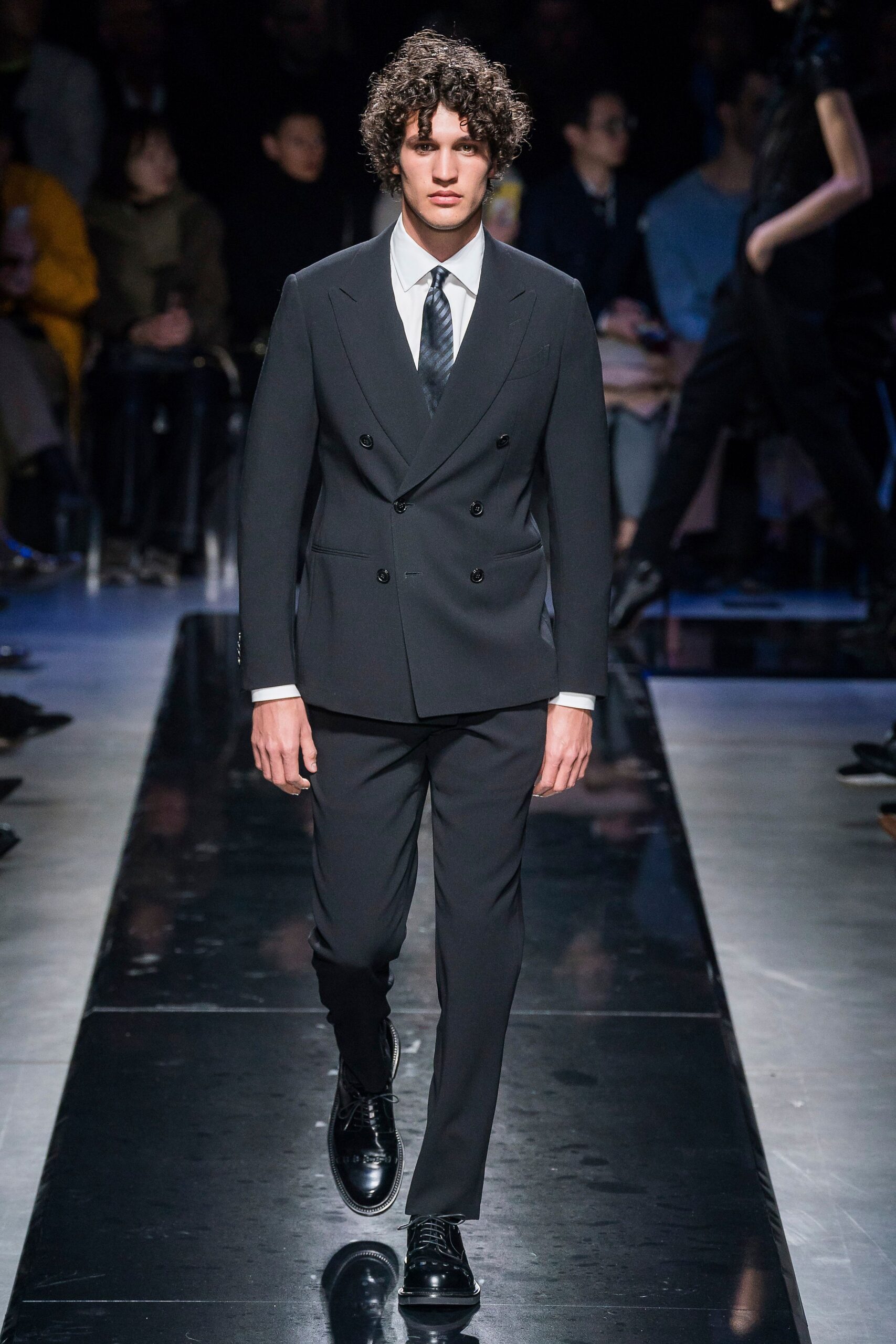 black tailored suit with white shirt
