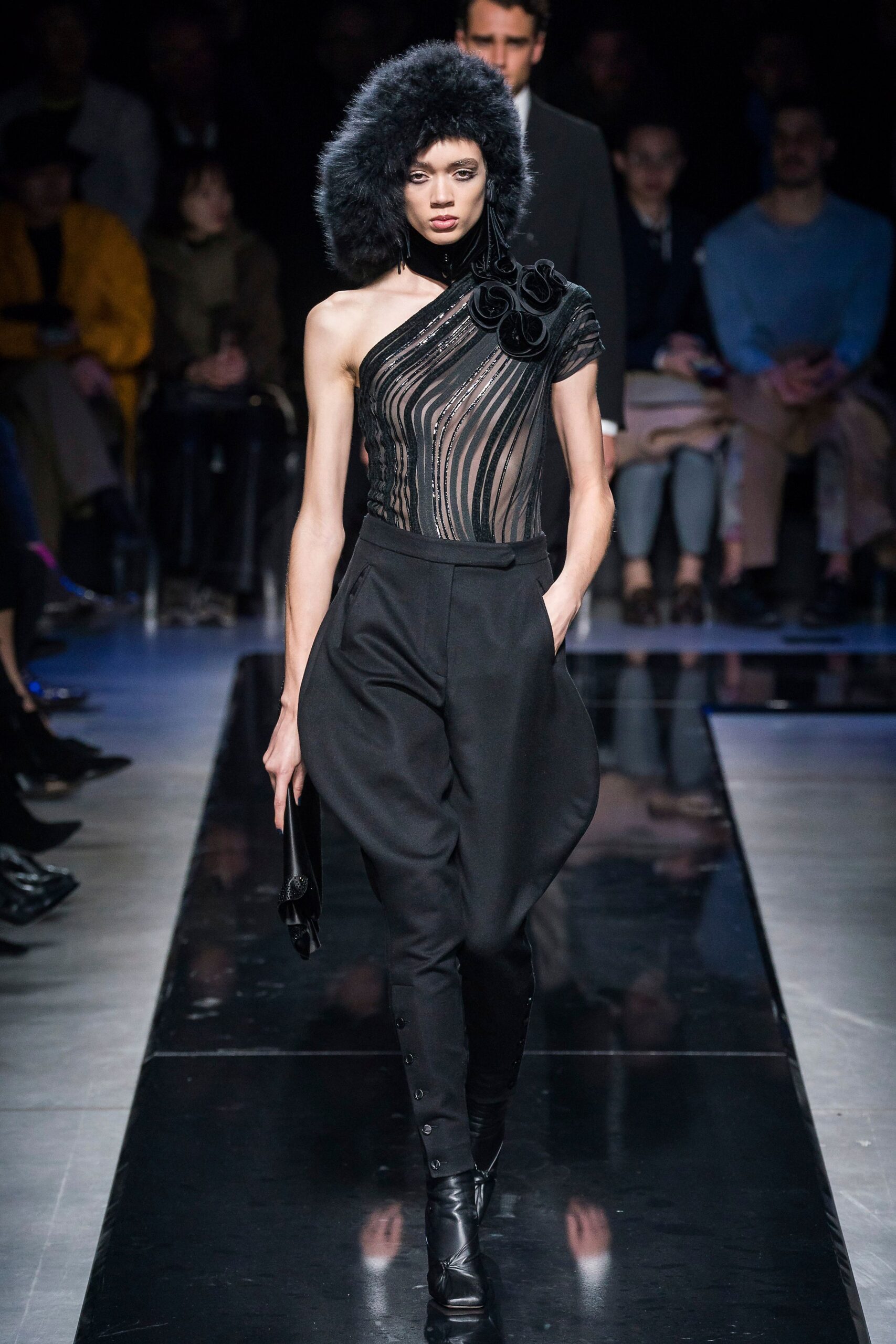 black fitted top and relaxed pants