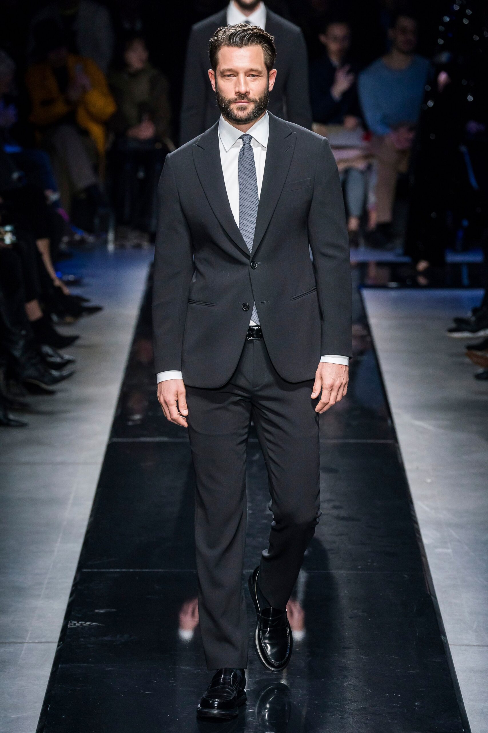 black tailored suit with white shirt