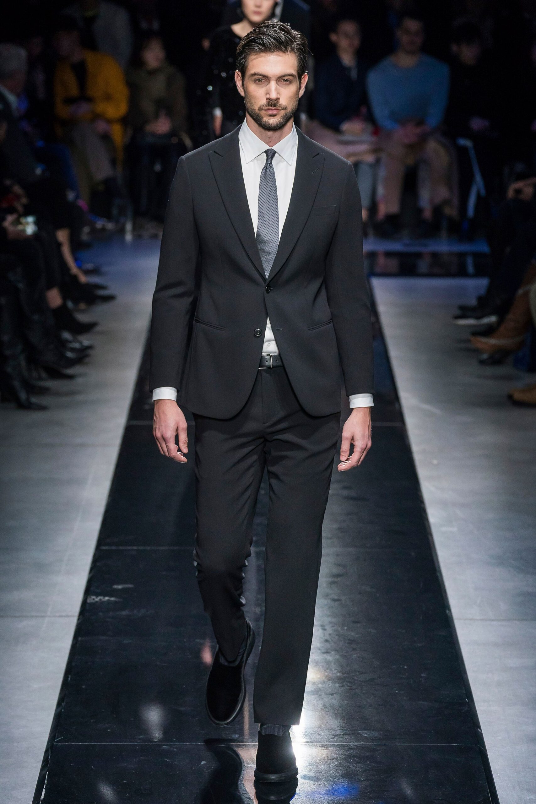 black tailored suit with white shirt