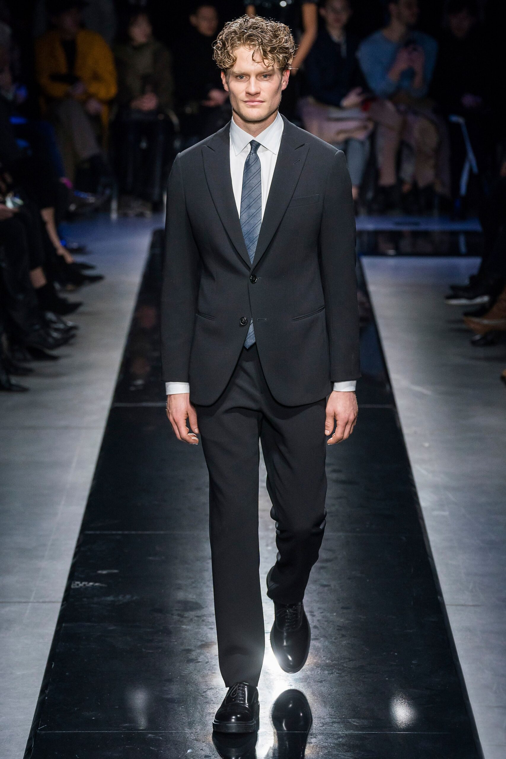 black tailored suit with white shirt