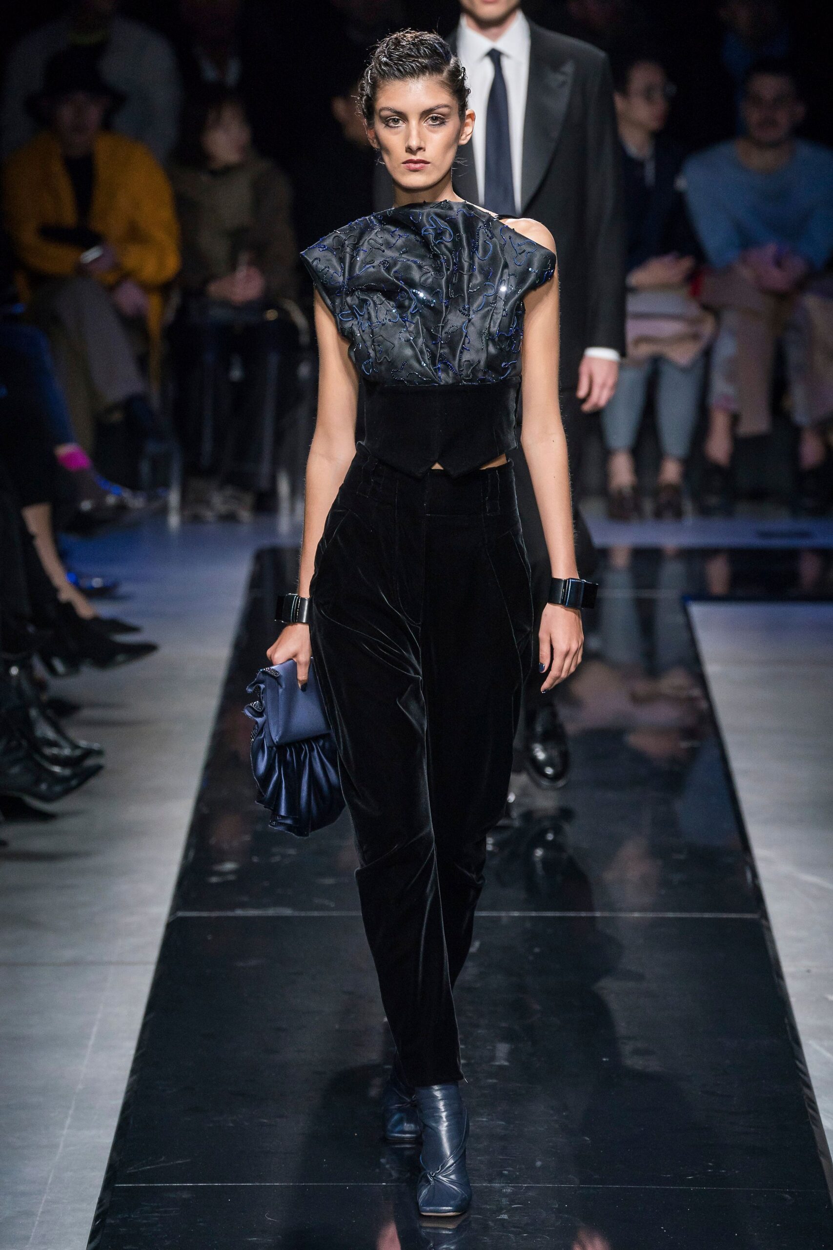 black fitted top with velvet pants