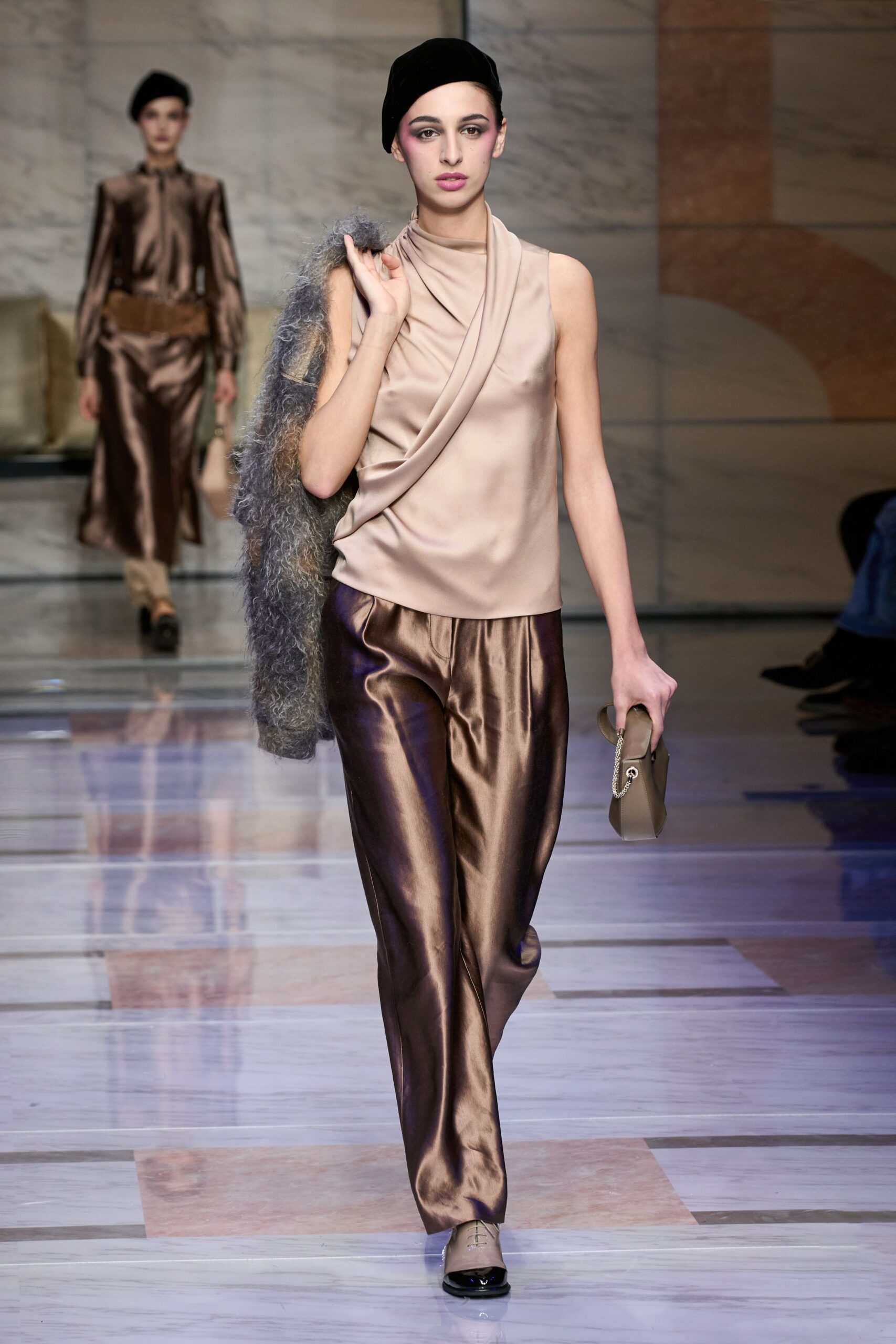beige silk sleeveless high-neck fitted draped top
