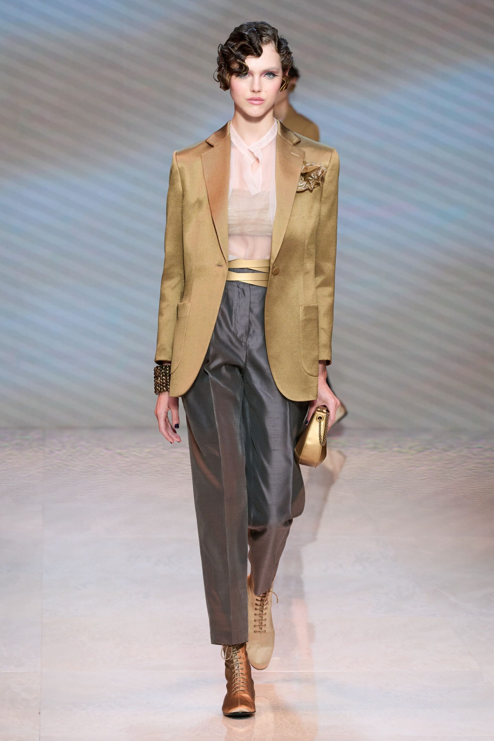 gold tailored blazer with gray pants