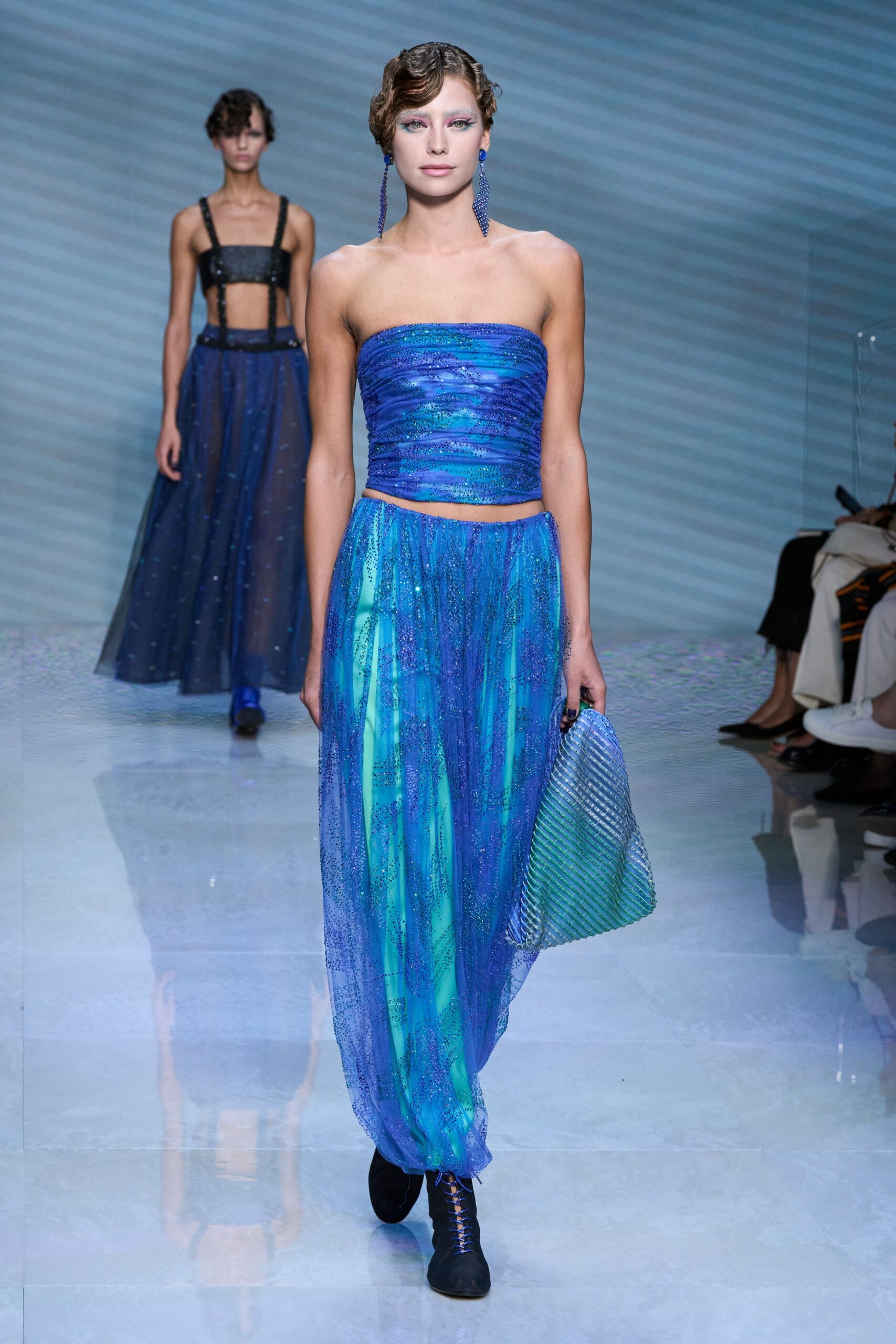 blue silk strapless fitted pleated layered flowing gown