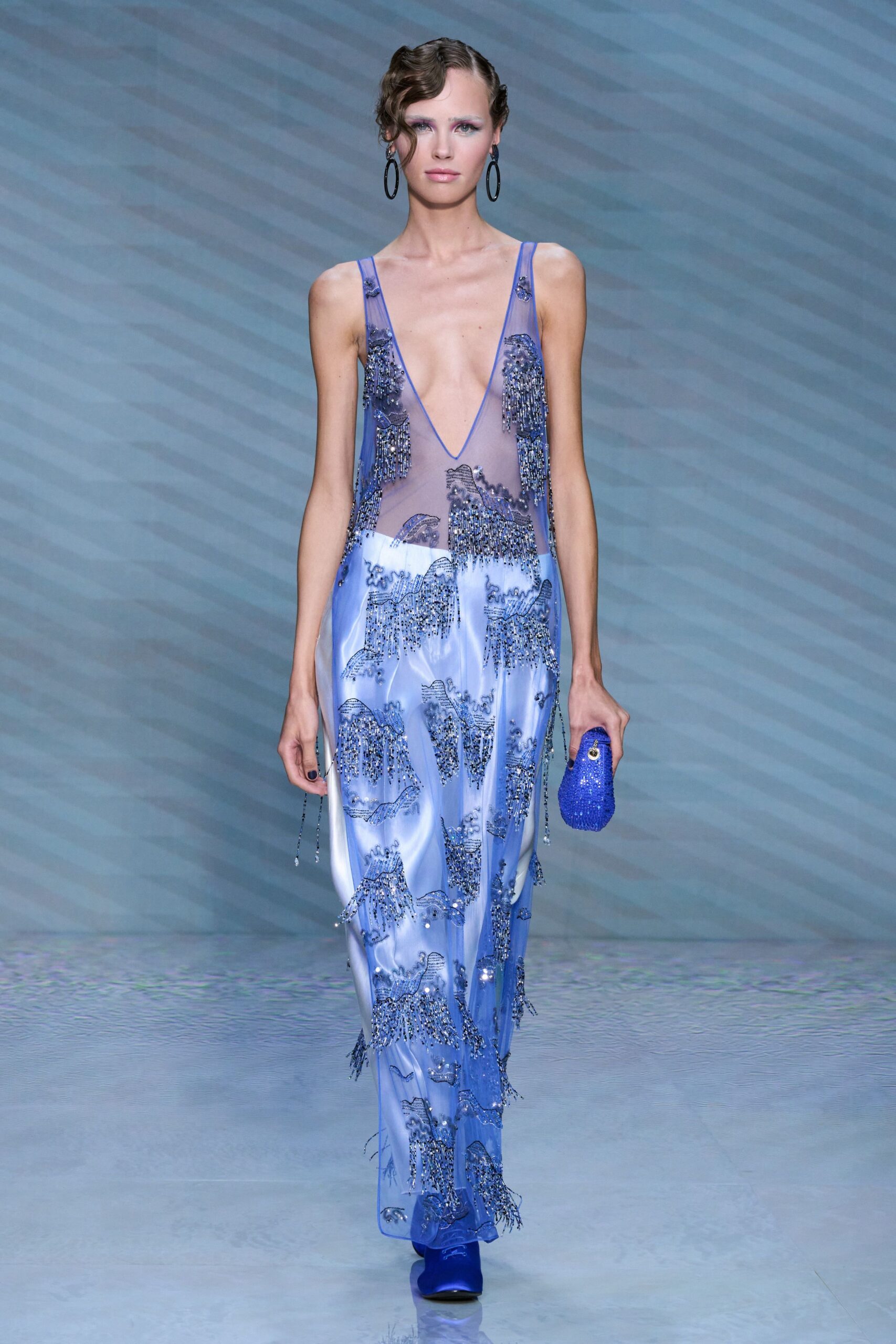 blue silk sleeveless v-neck fitted embellished gown