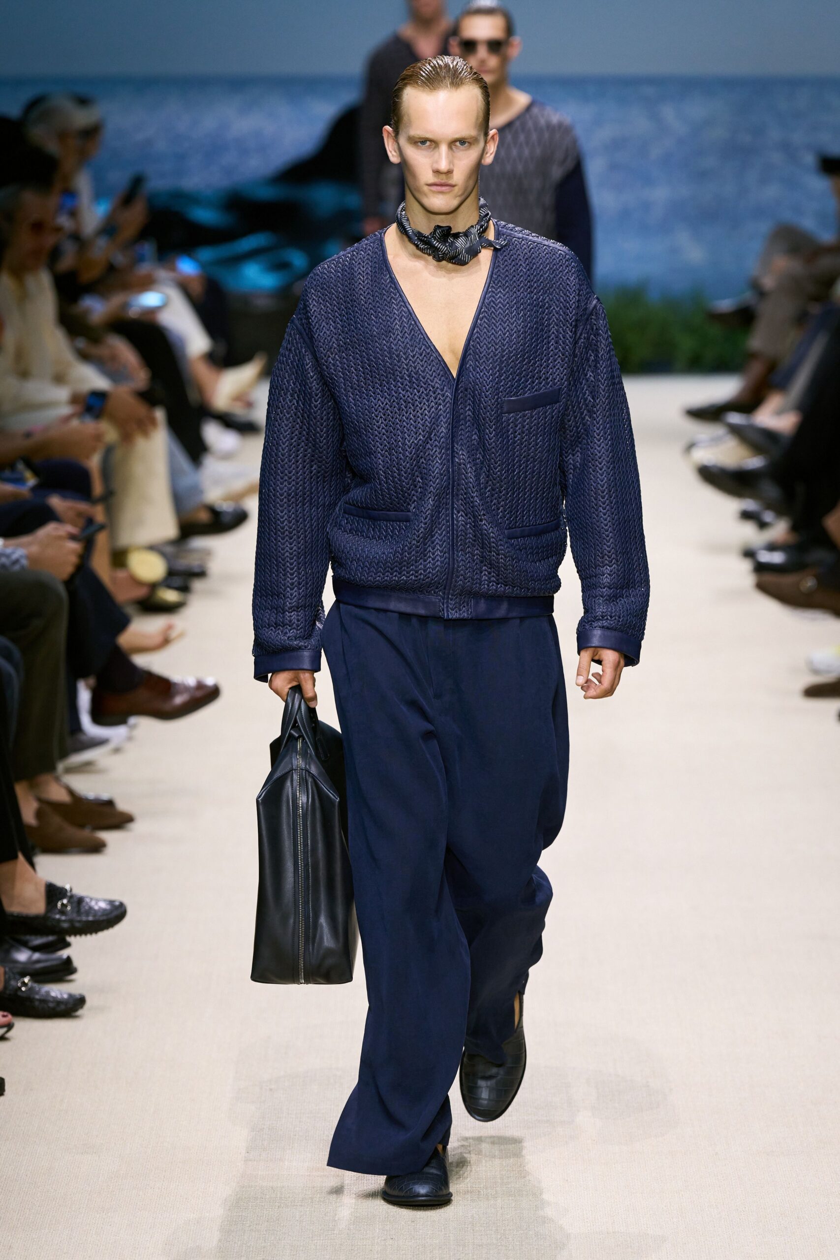 blue knitted cardigan with navy pants