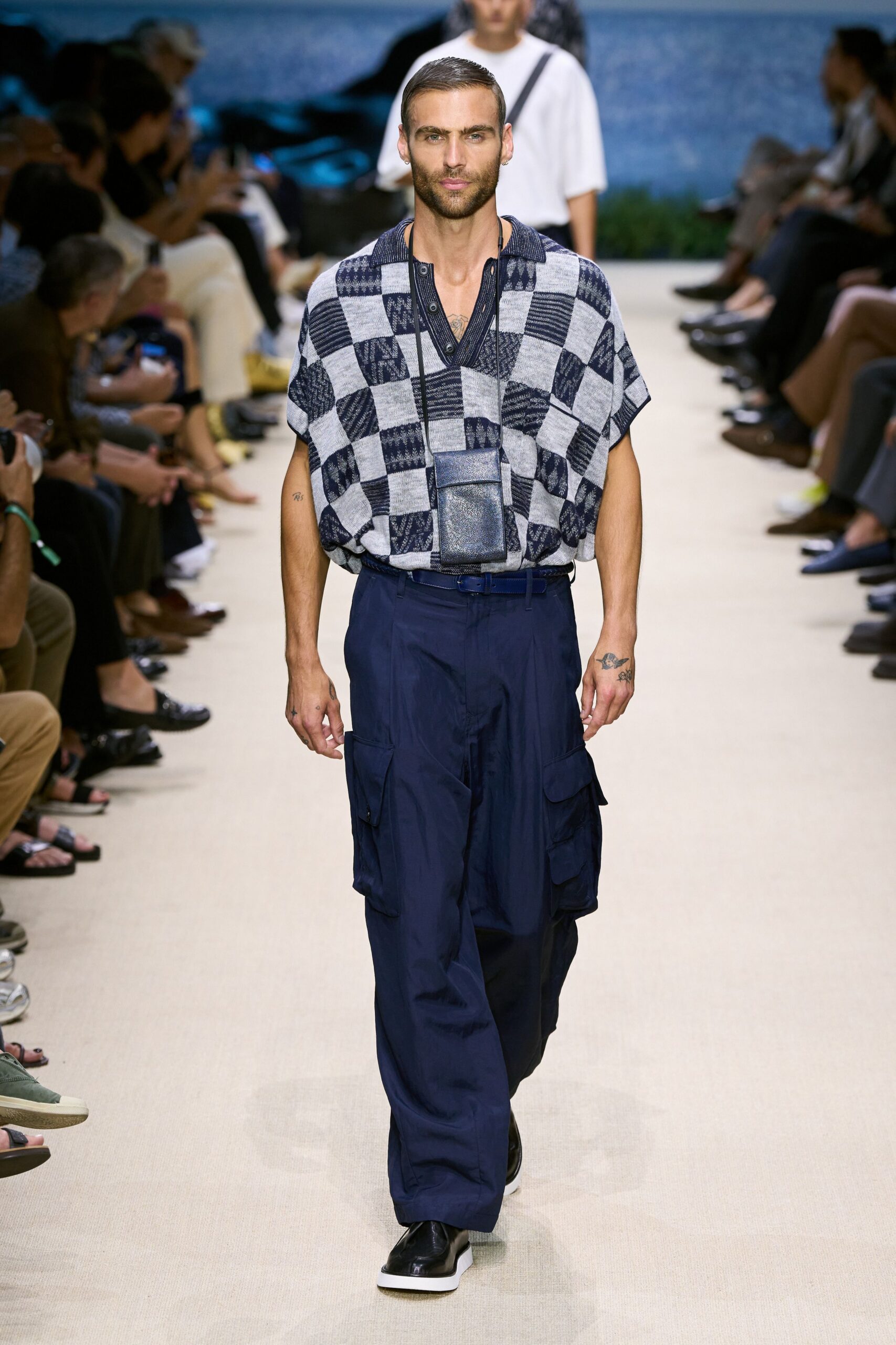 blue and white checked top with navy cargo pants