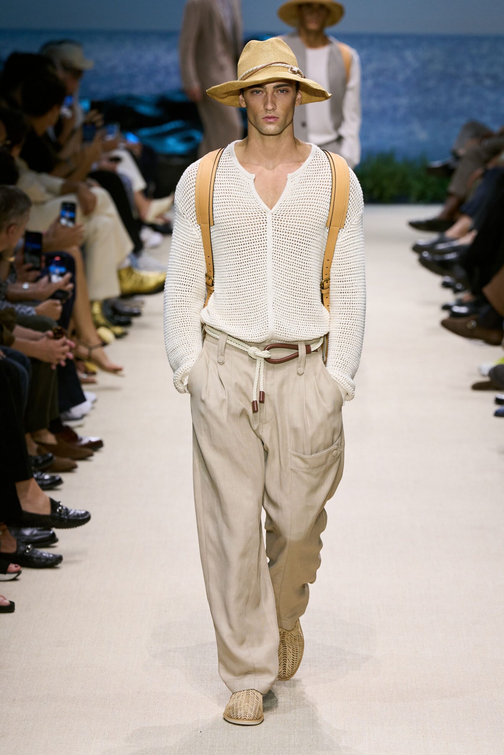 white knit shirt beige pants