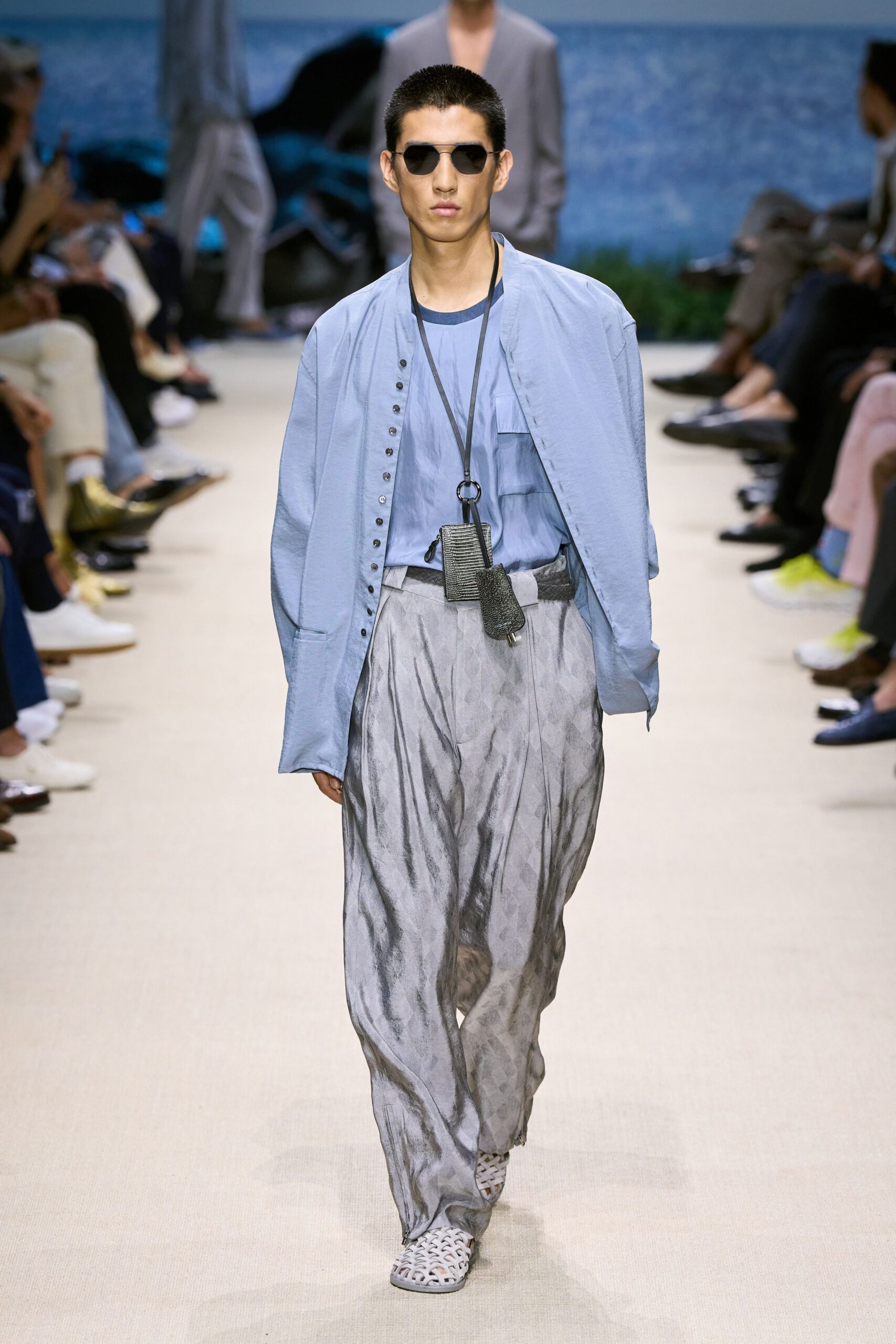 blue relaxed jacket with gray pants