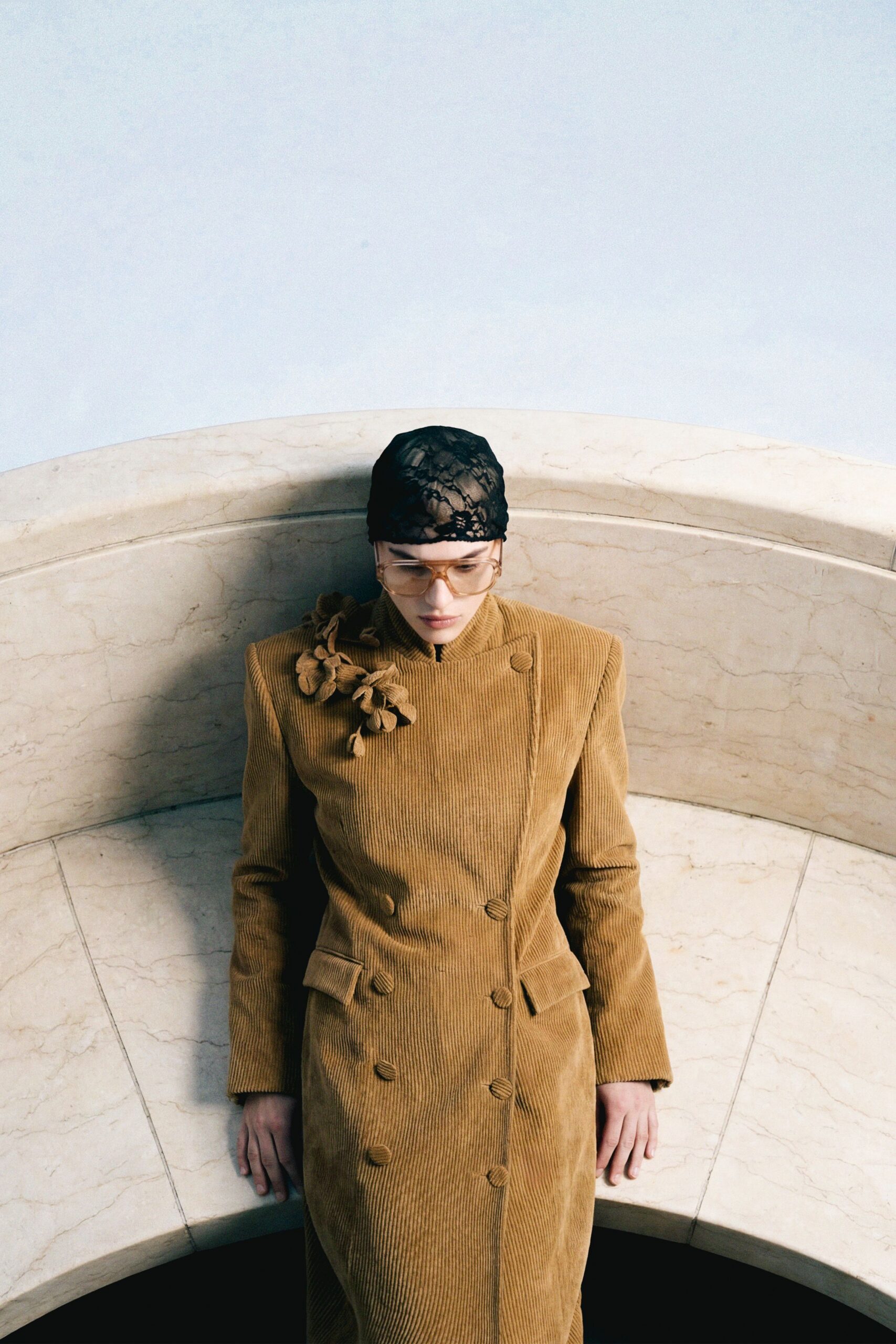 brown long-sleeve double-breasted structured buttoned coat