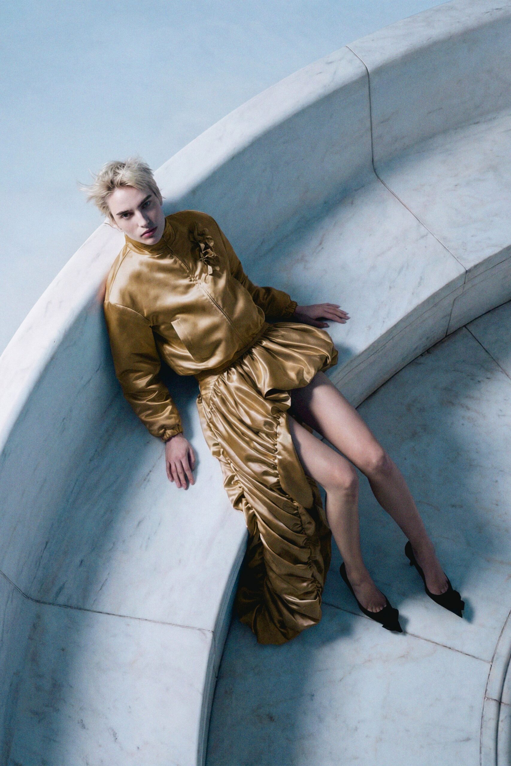 gold silk long-sleeve high-neck fitted ruffled shiny dress