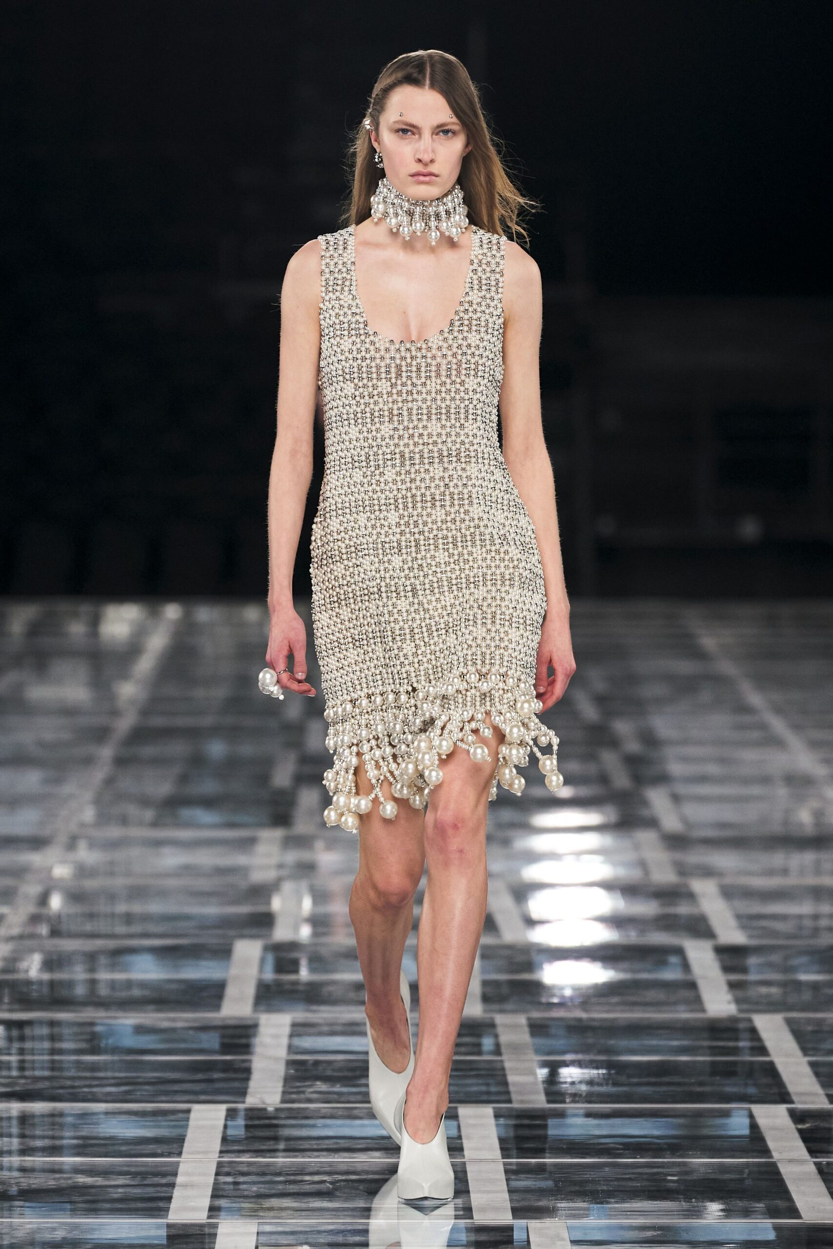 white cotton sleeveless v-neck fitted fringed short dress