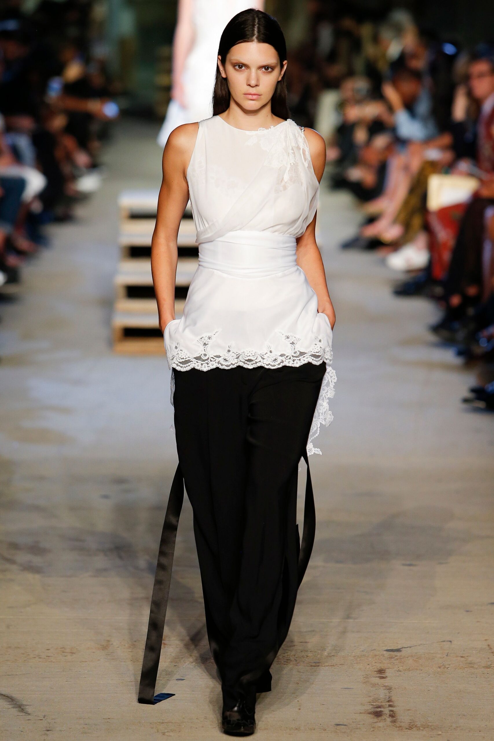 white fitted top with black pants