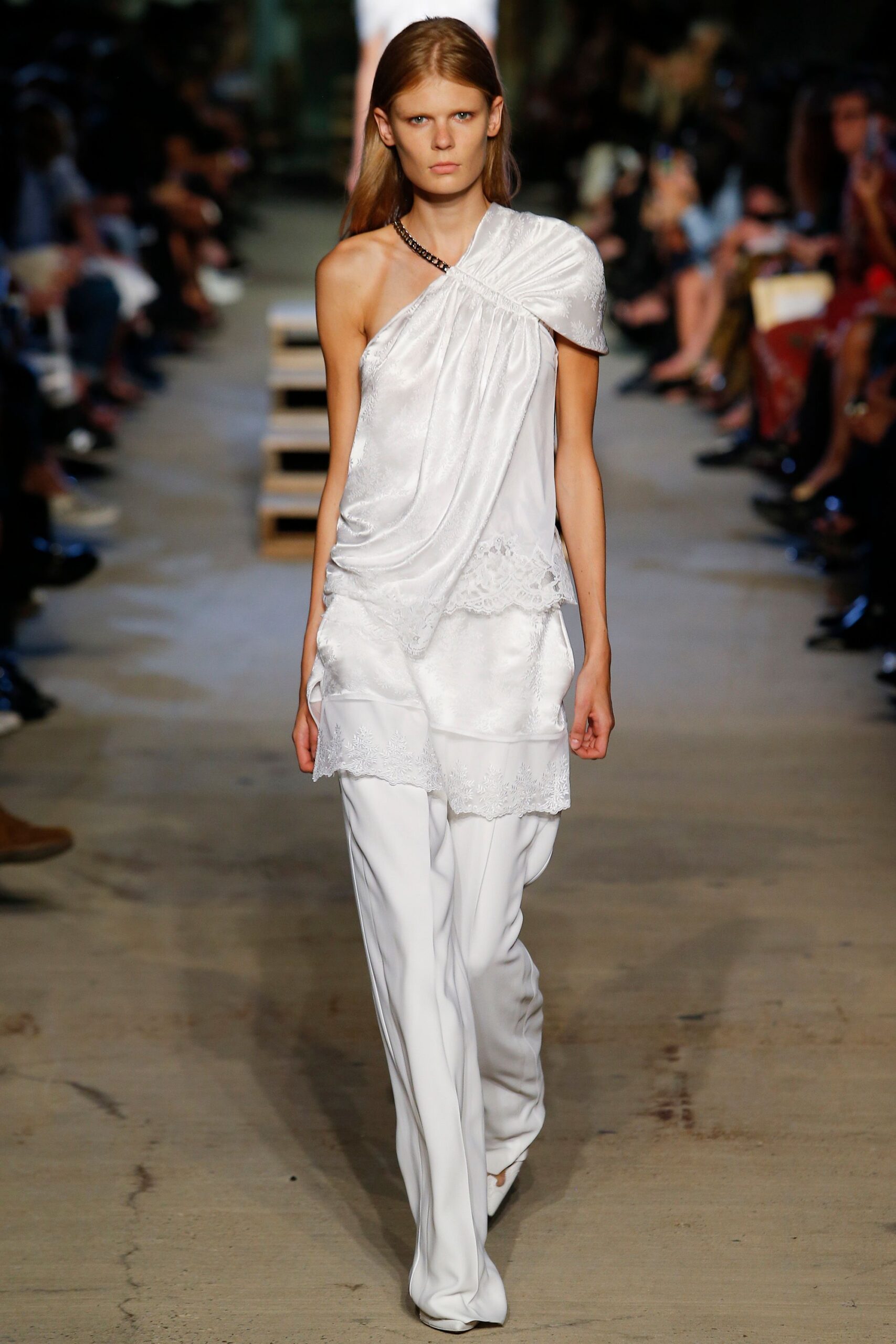 white silk draped top and pants