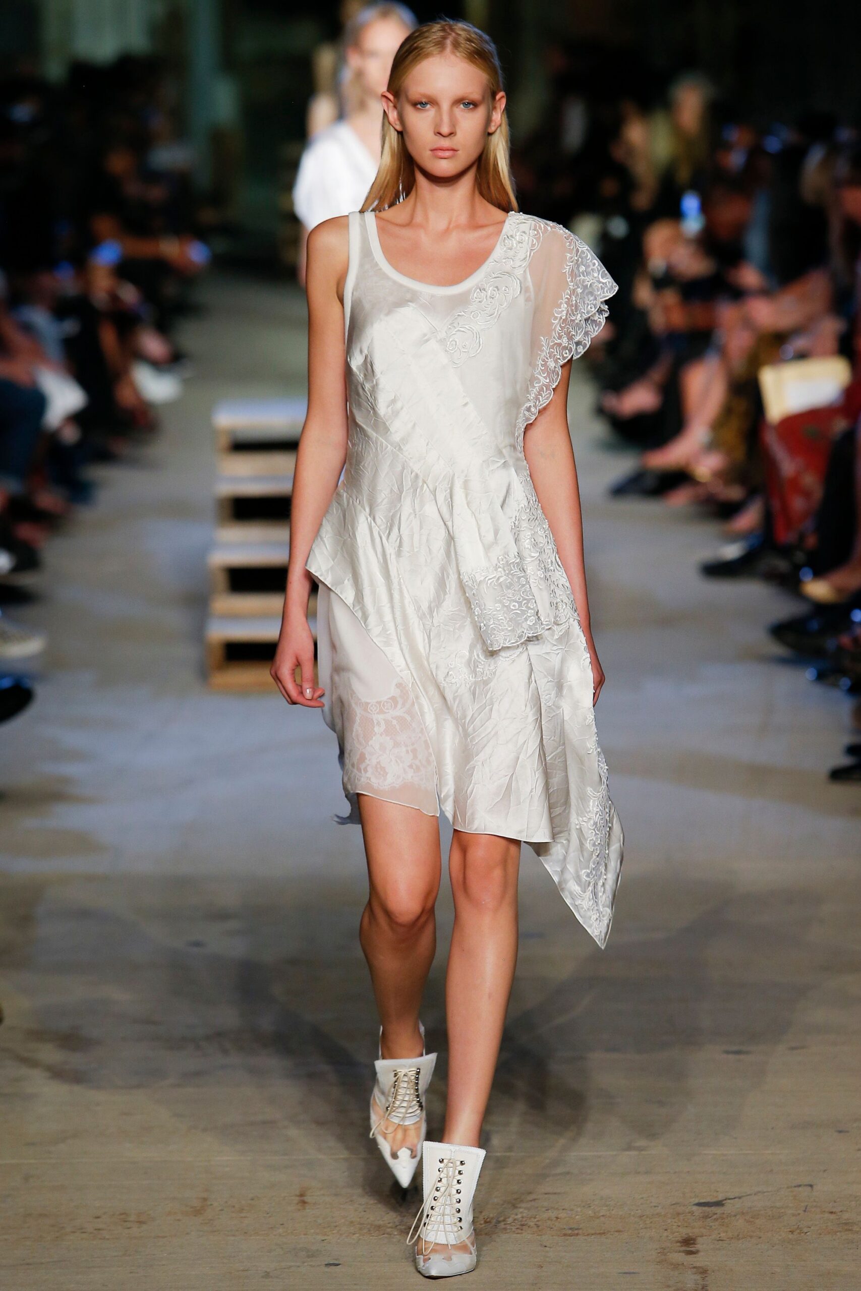 white asymmetric ruffled dress and shoes