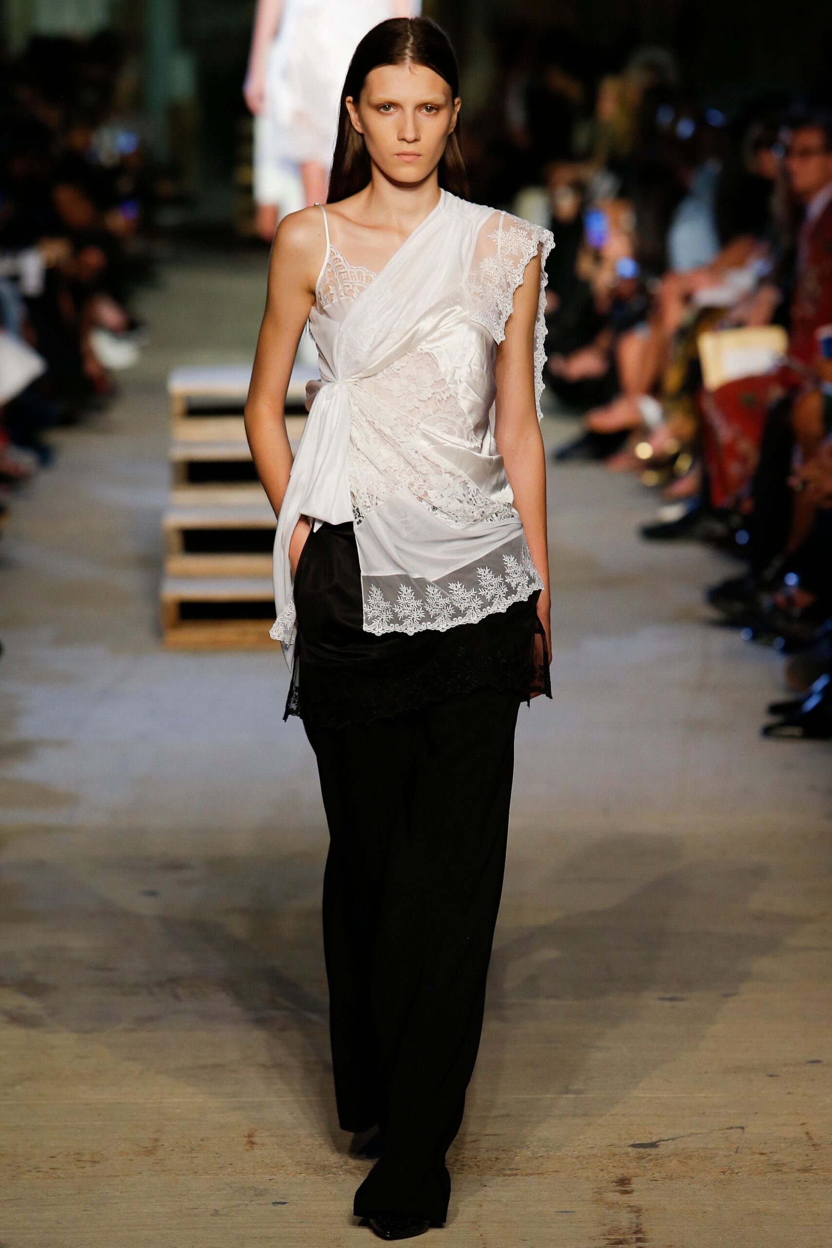 white embroidered top with black pants
