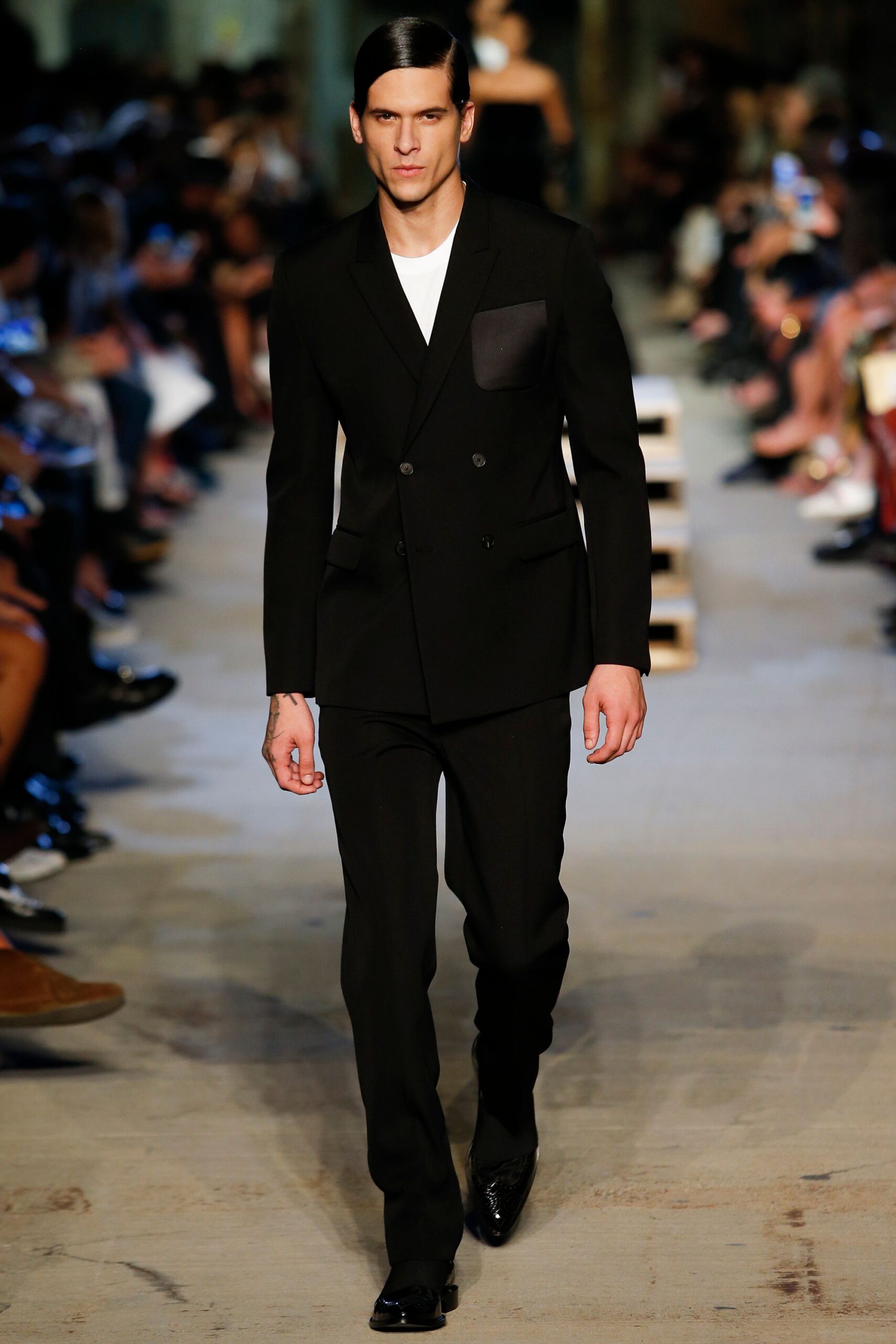 black tailored suit with white t-shirt