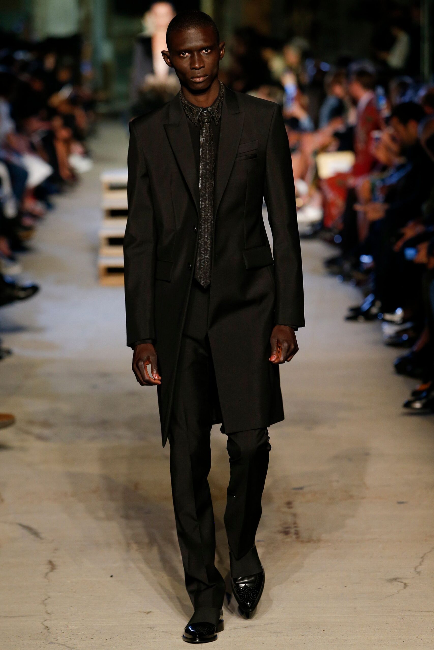 black tailored suit with silk shirt