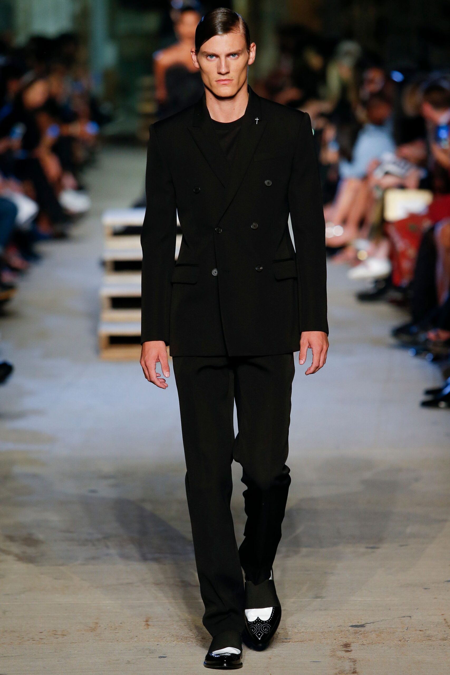black tailored suit with embellished shoes