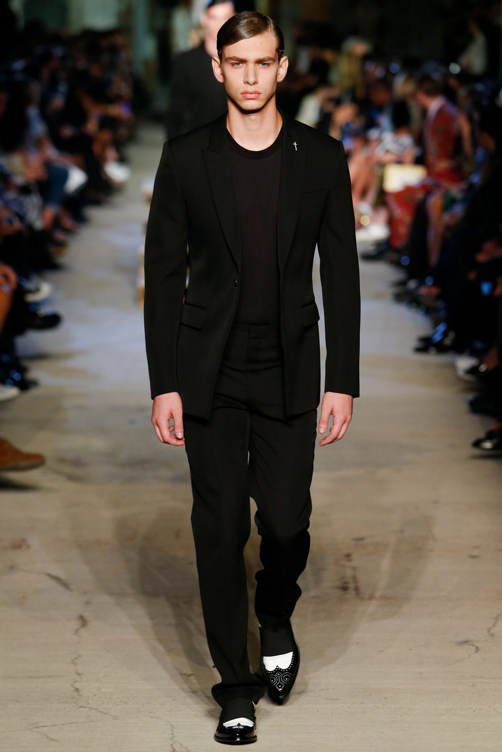 black tailored suit with embellished shoes