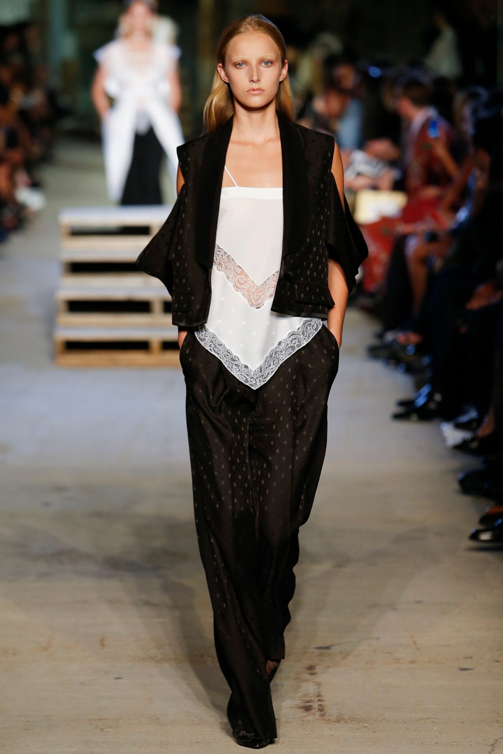 black silk relaxed pants with white top