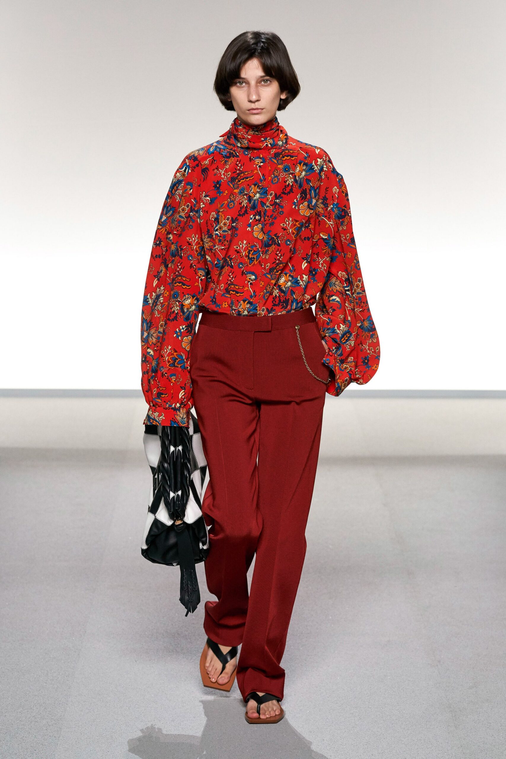 red silk long-sleeve high-neck relaxed floral blouse