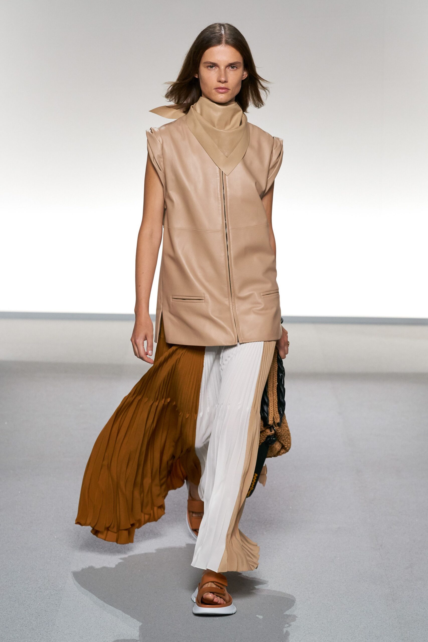 beige leather sleeveless v-neck relaxed zippered top